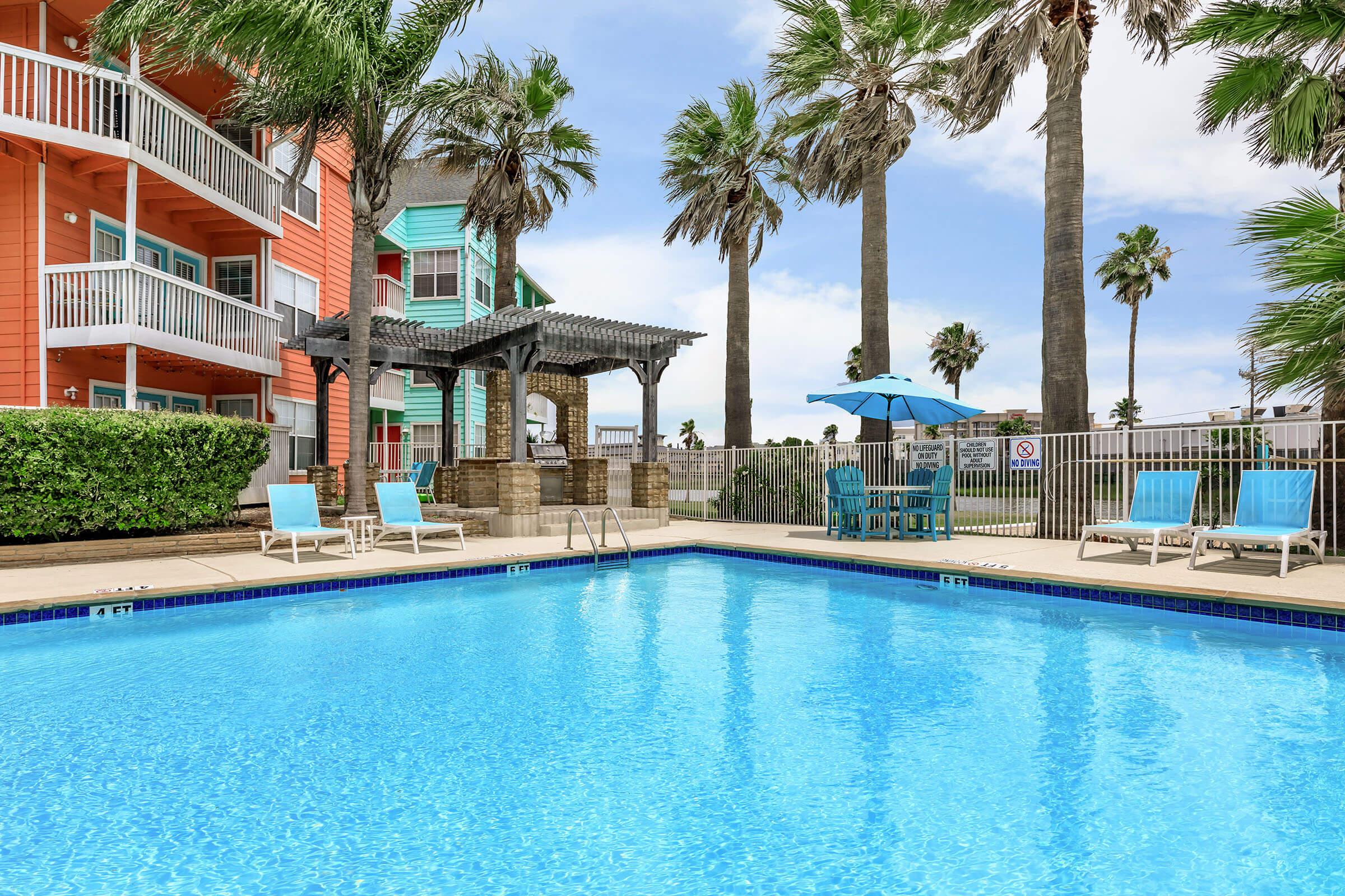 a pool next to a body of water