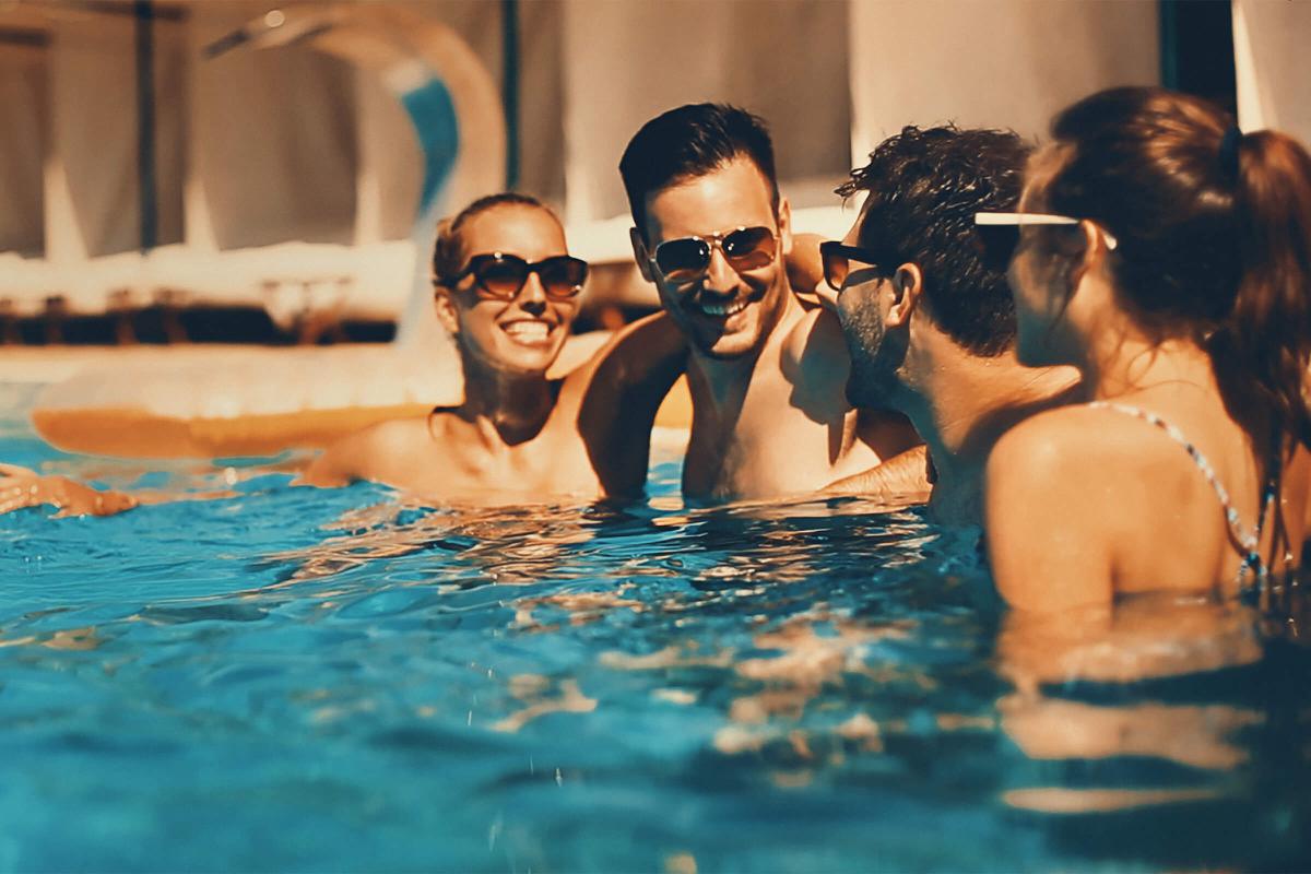 a group of people swimming in the water