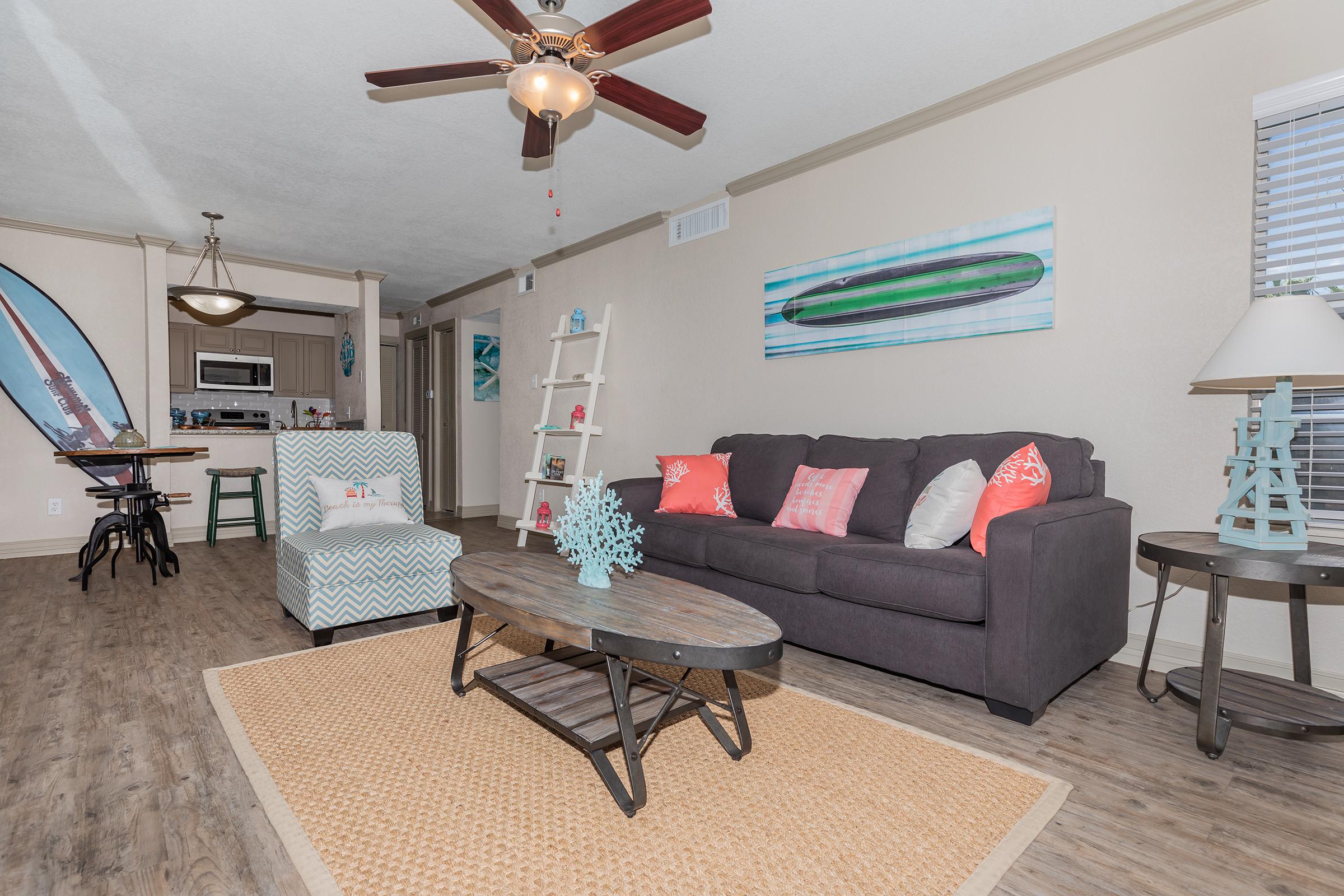 a living room with a couch and a chair