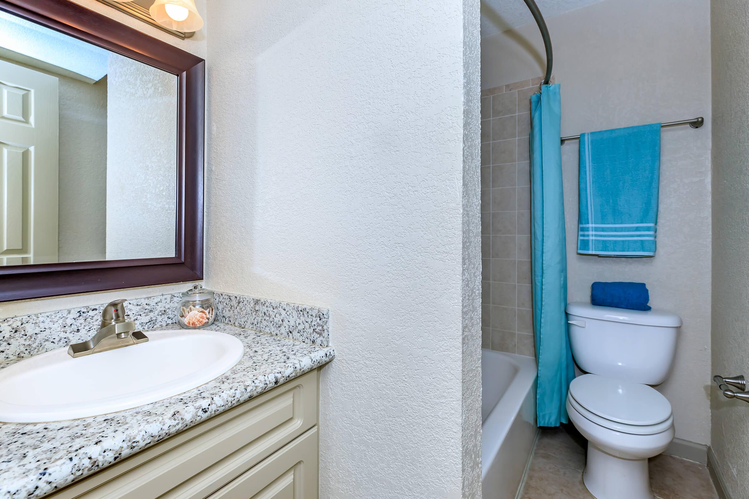 a white sink sitting under a blue sky