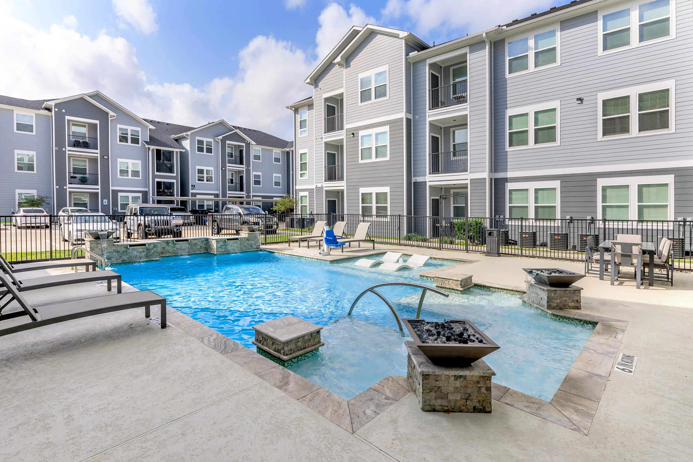 a pool of water in front of a building