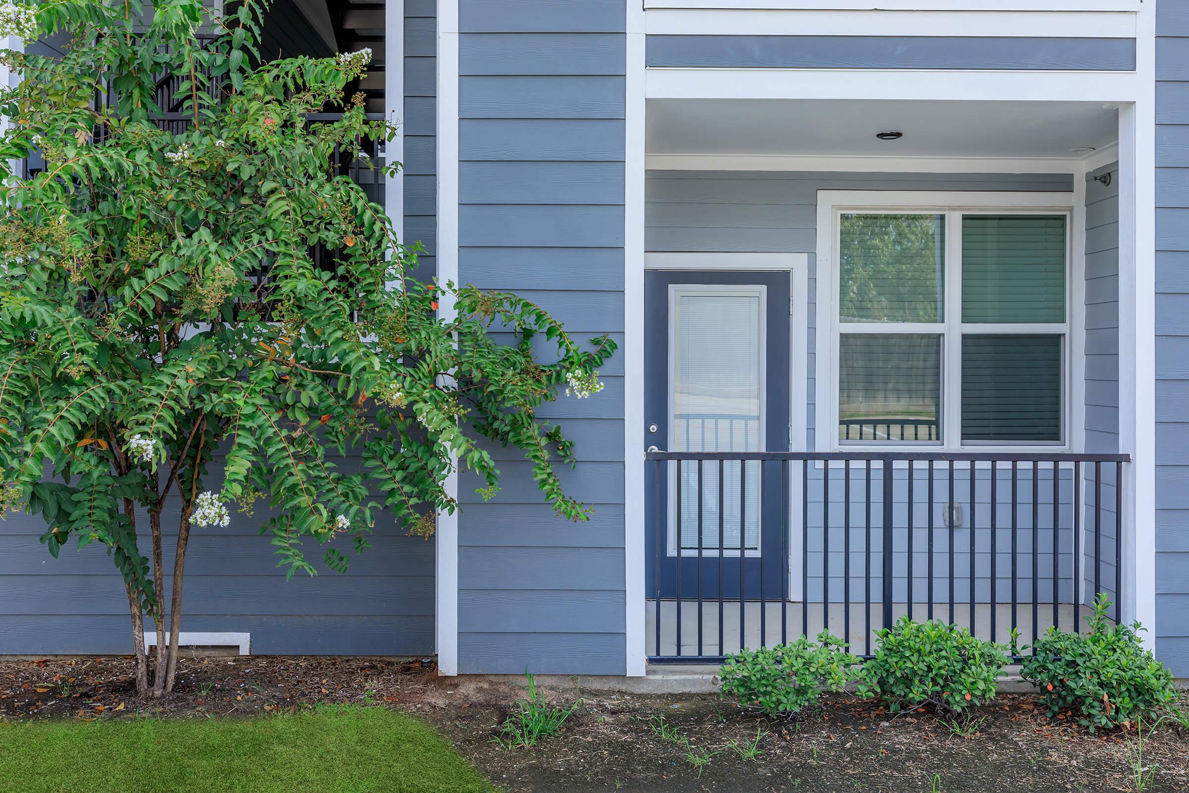 a garden in front of a house