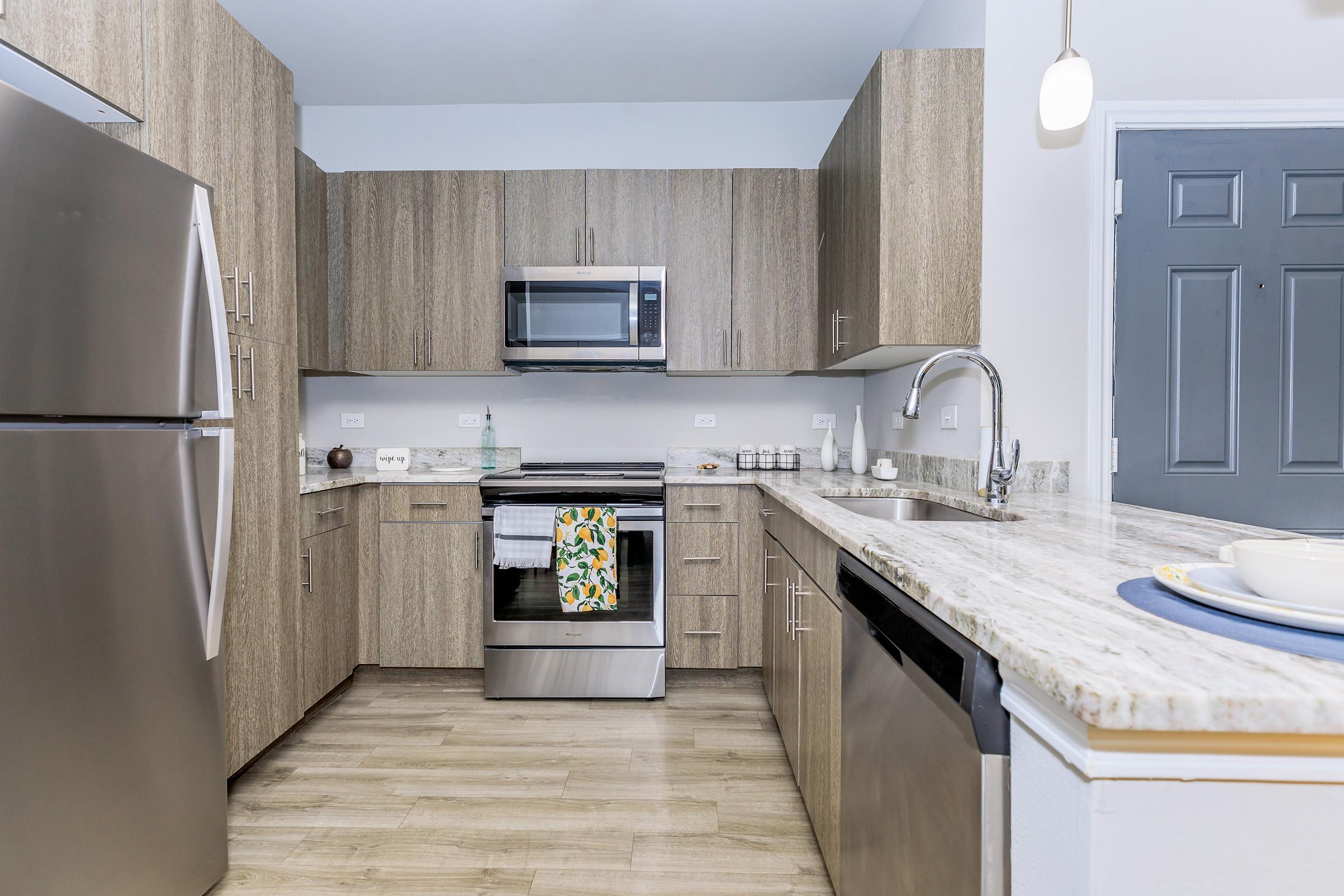 a kitchen with a sink and a window