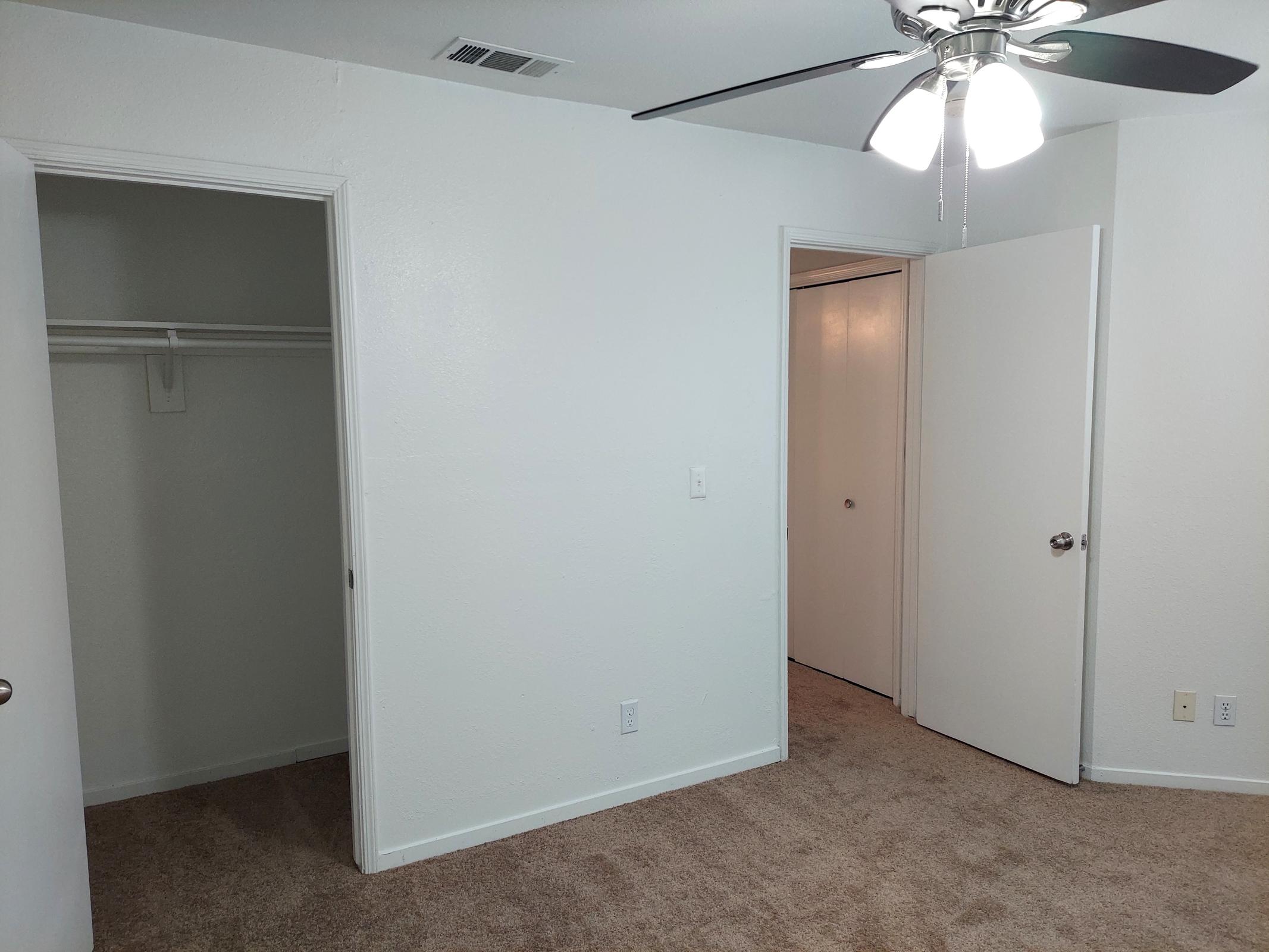 a refrigerator in a small room