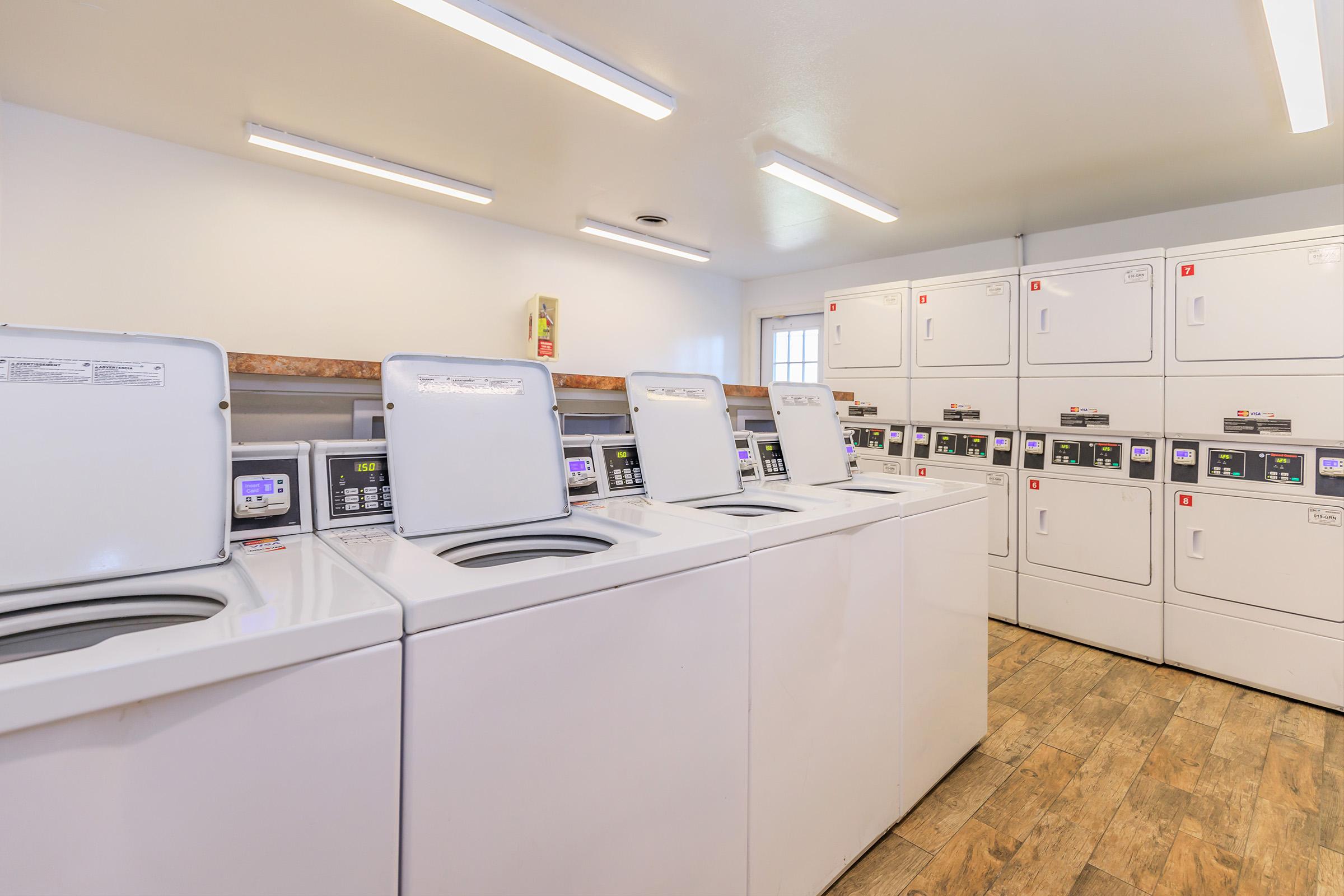 a kitchen with a stove and a refrigerator