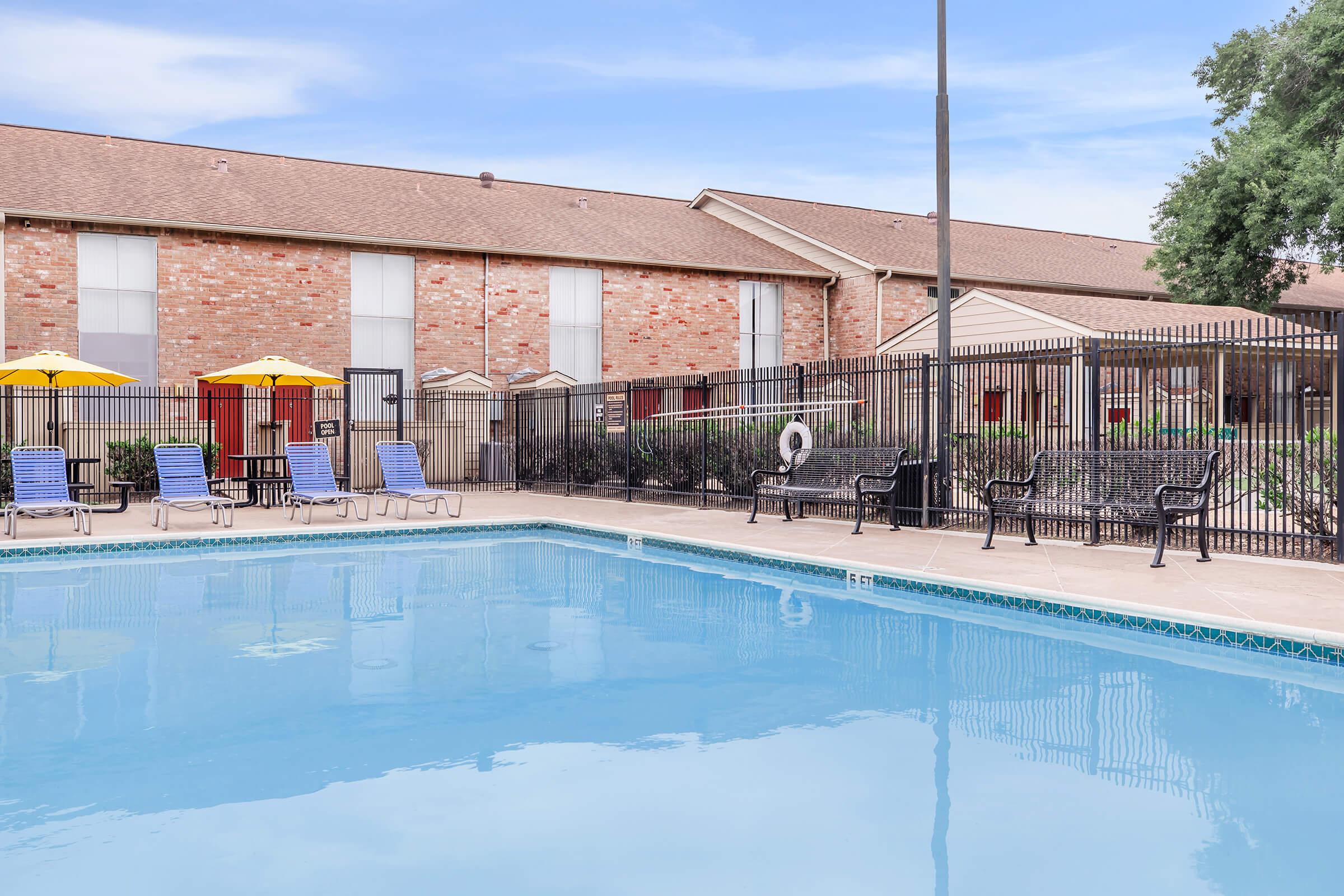 a pool next to a building