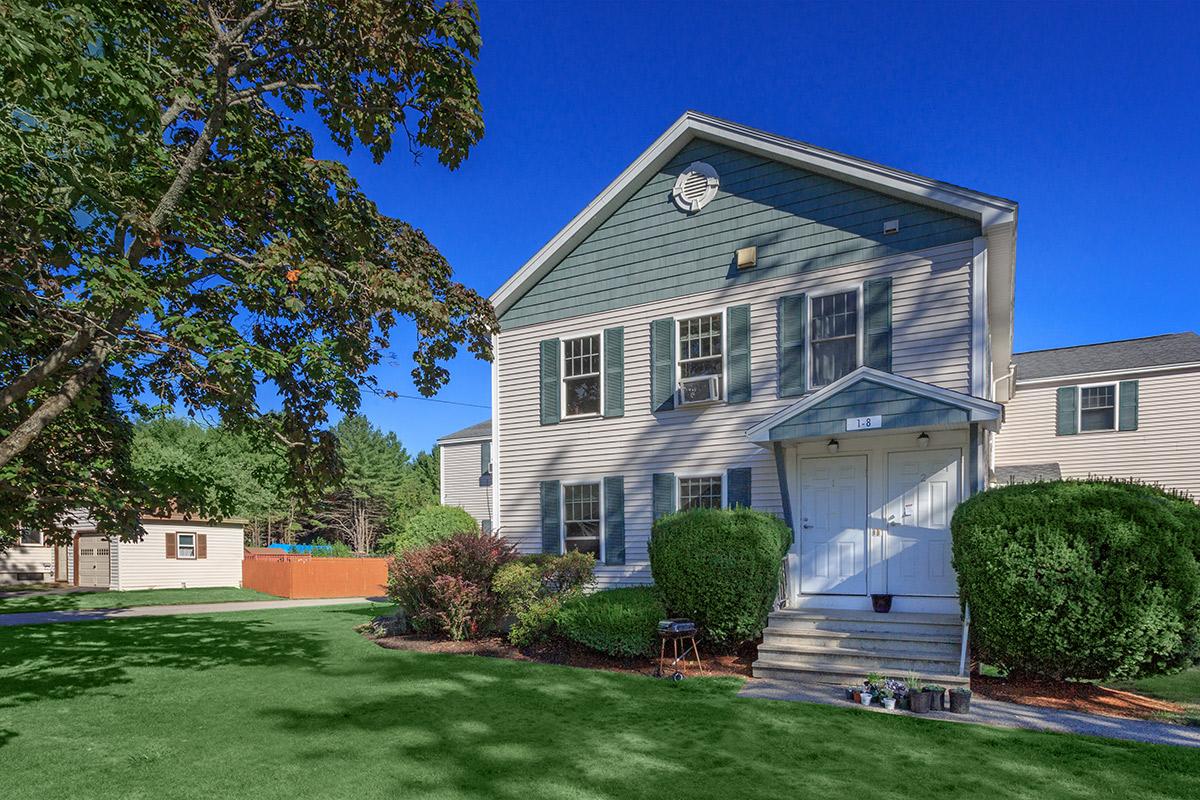 a large lawn in front of a house