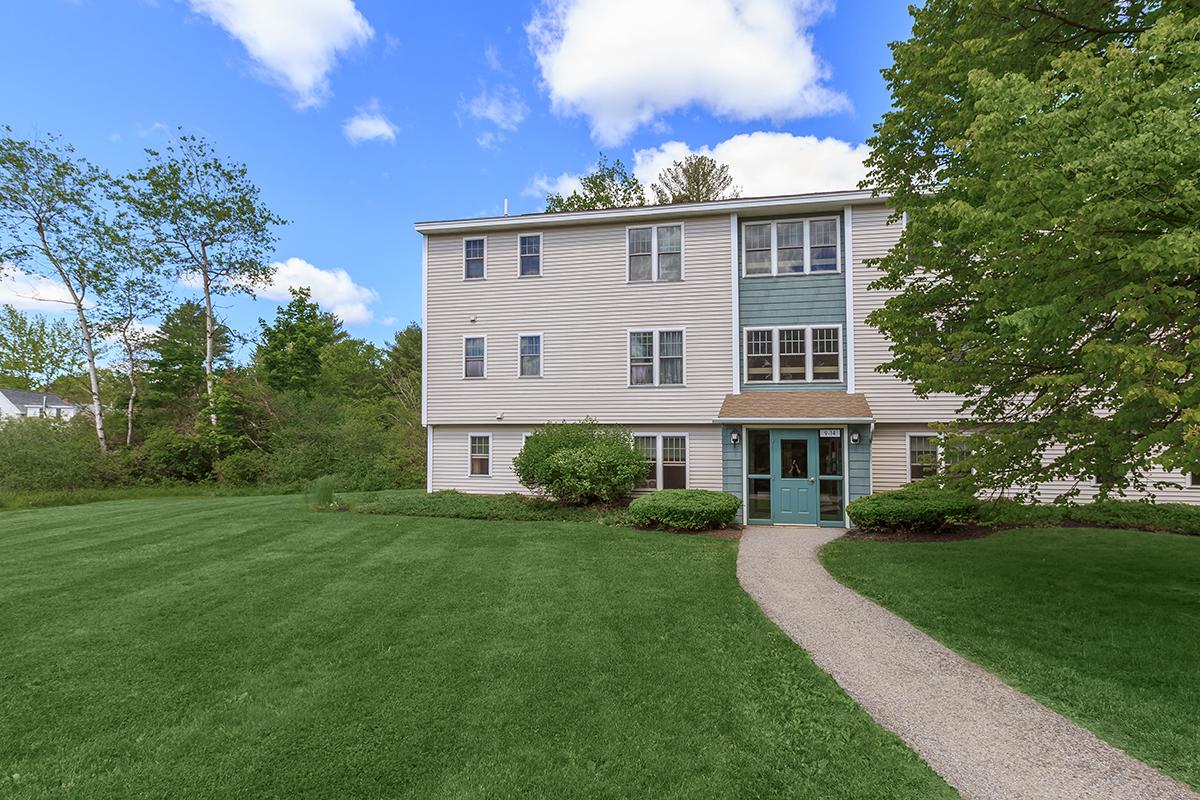 a large lawn in front of a house