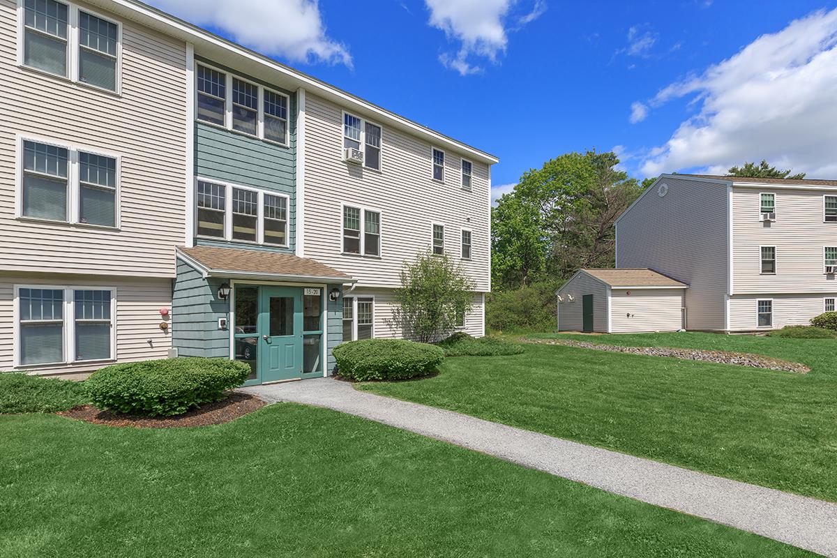 a large lawn in front of a house