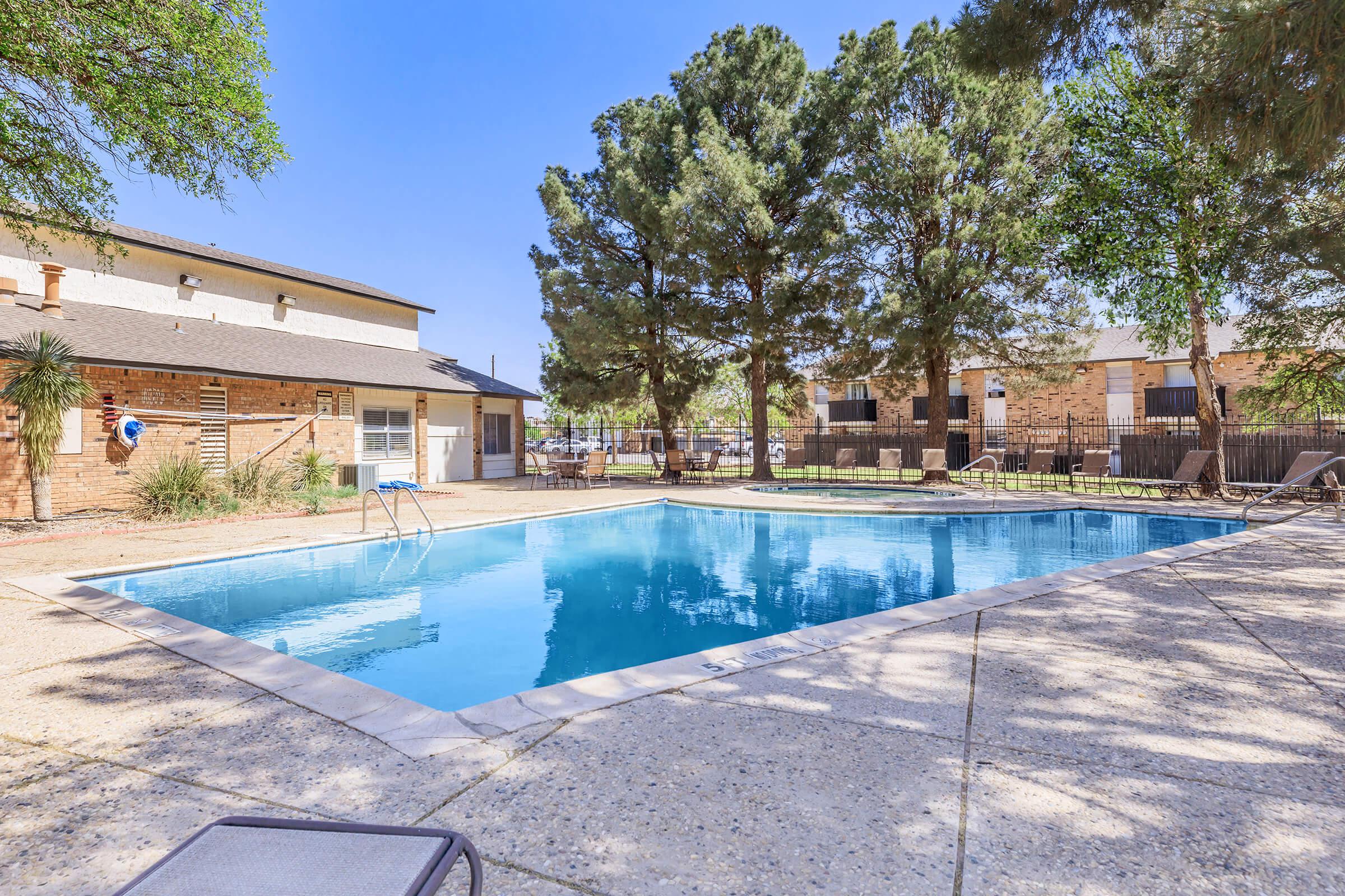 a pool next to a building