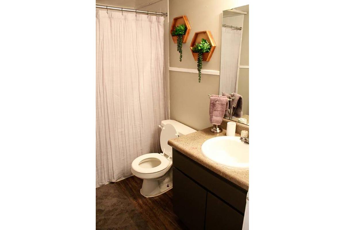 a small white sink in a bathroom