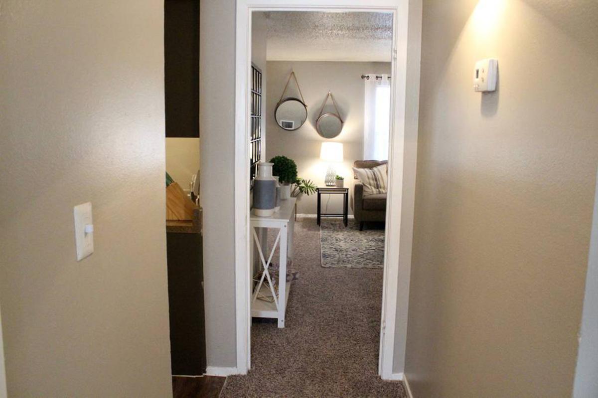 a white sink sitting next to a door