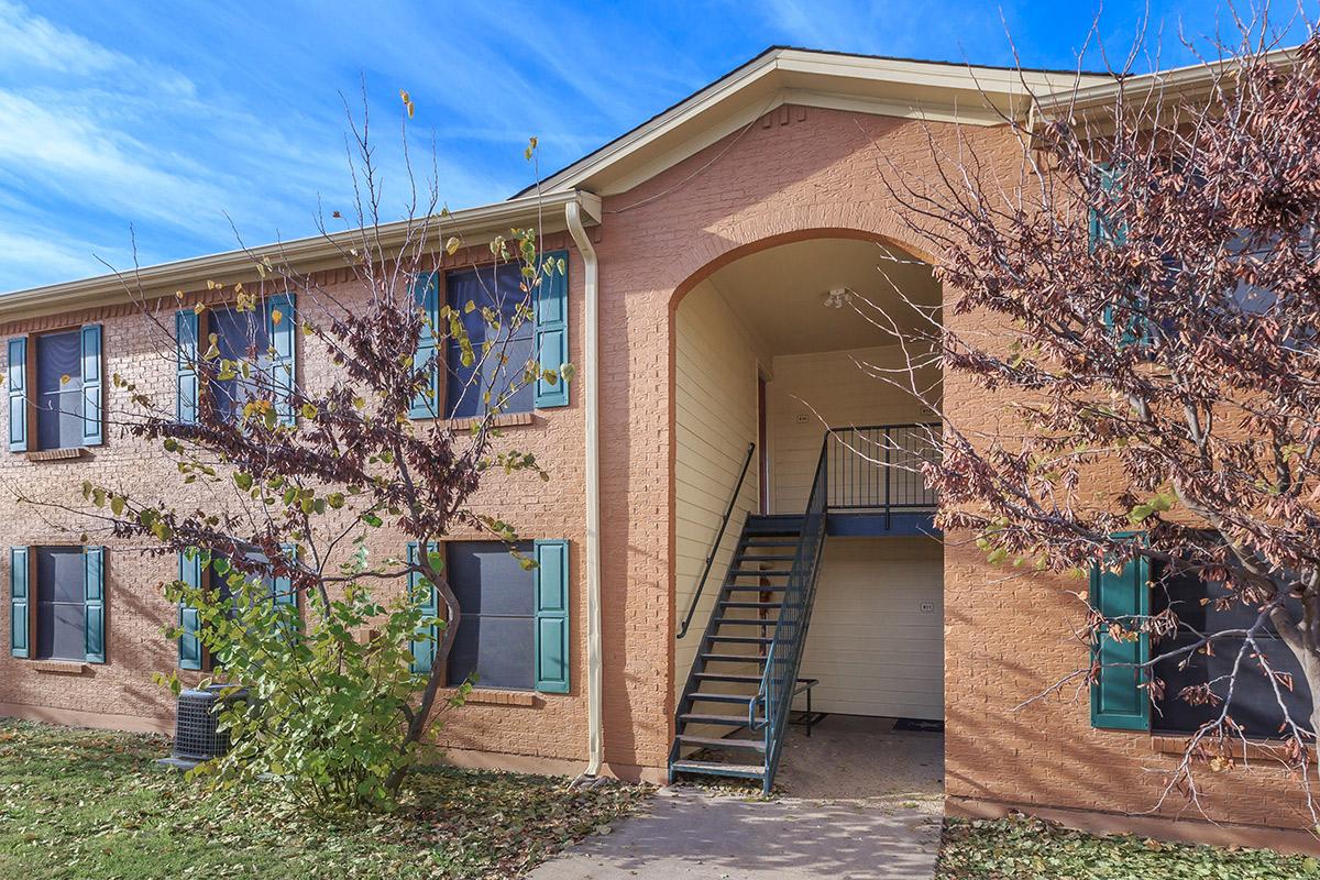 a house with trees in the background