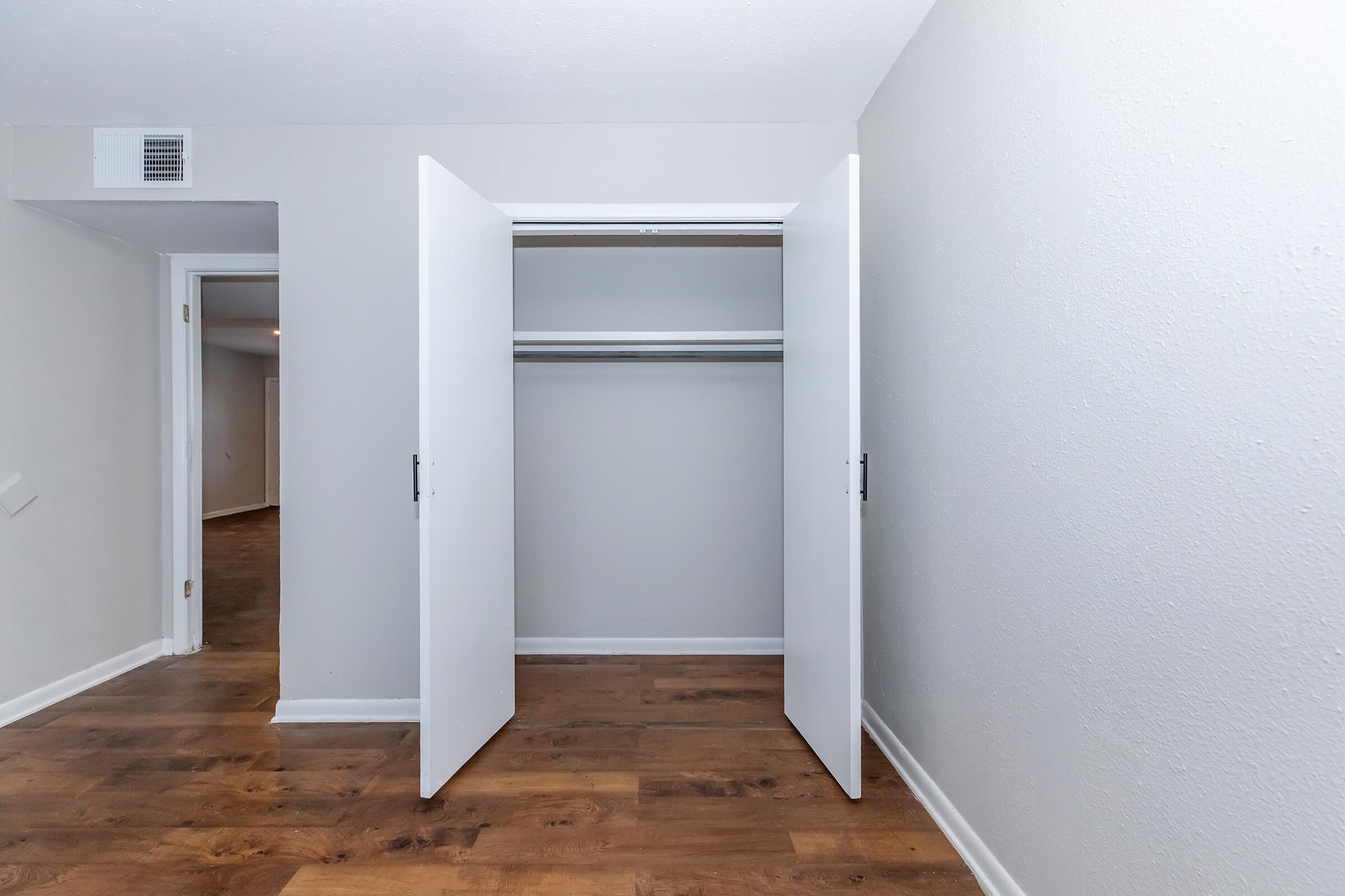 a refrigerator freezer sitting inside of a building