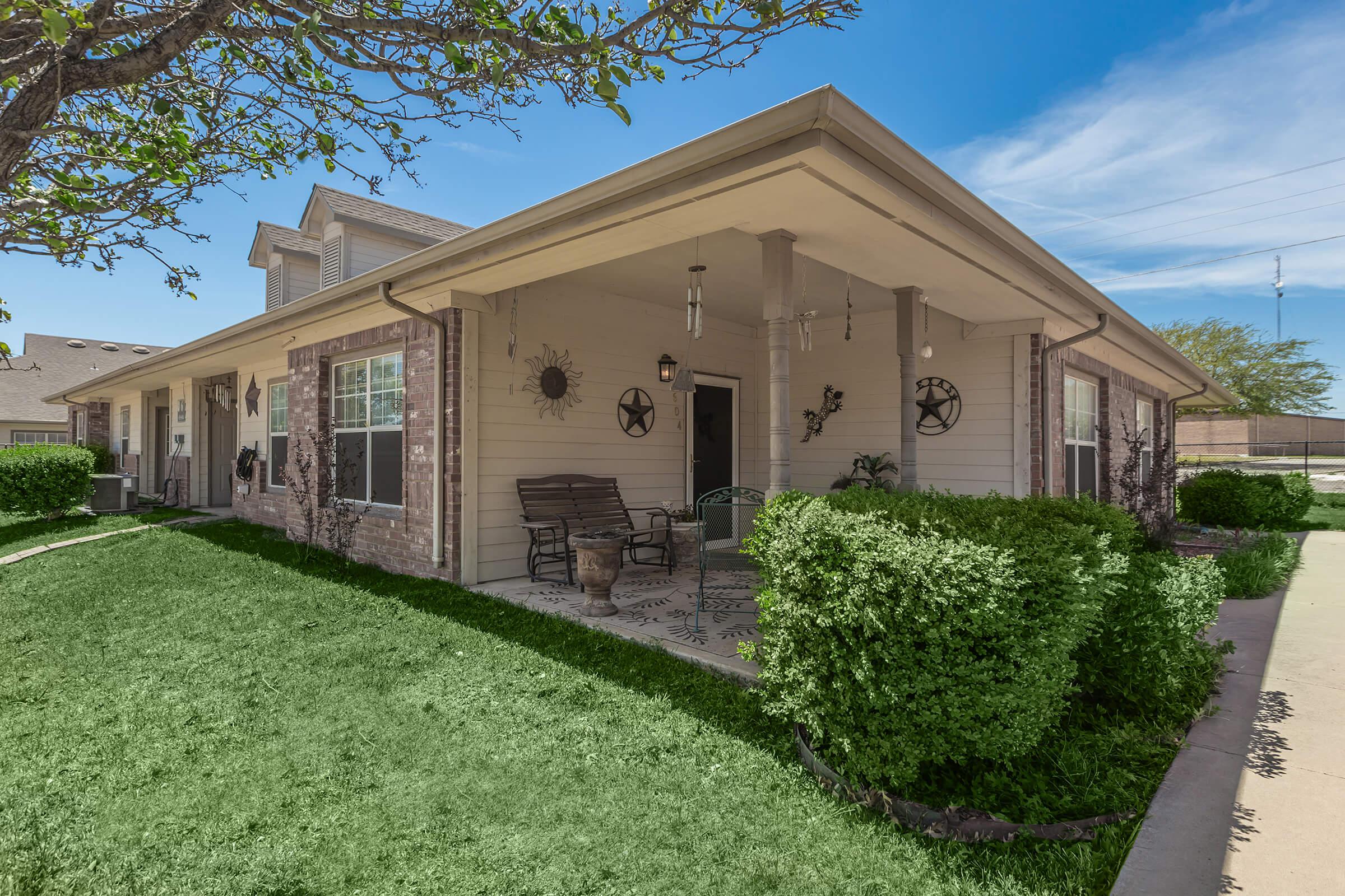 a large lawn in front of a house