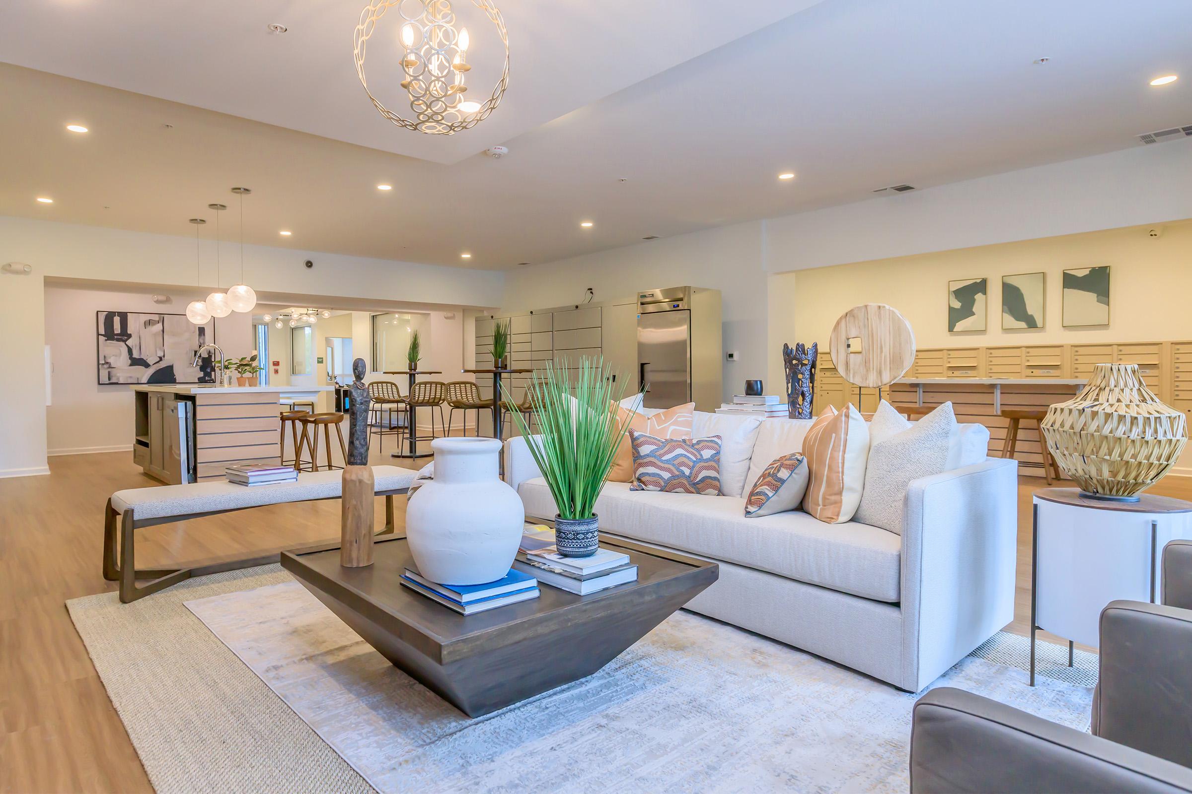 a living room filled with furniture and a fireplace