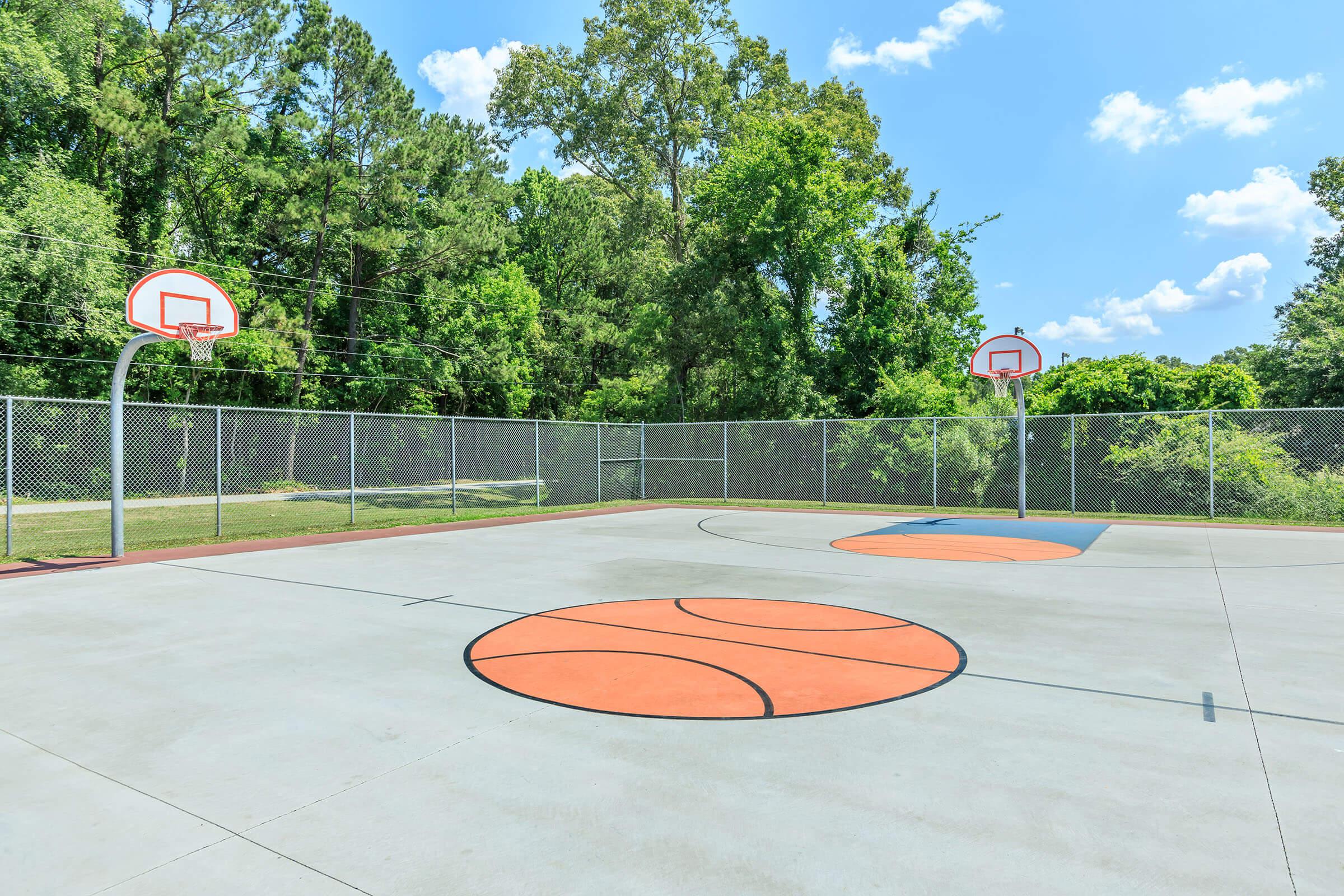 a basketball in a parking lot