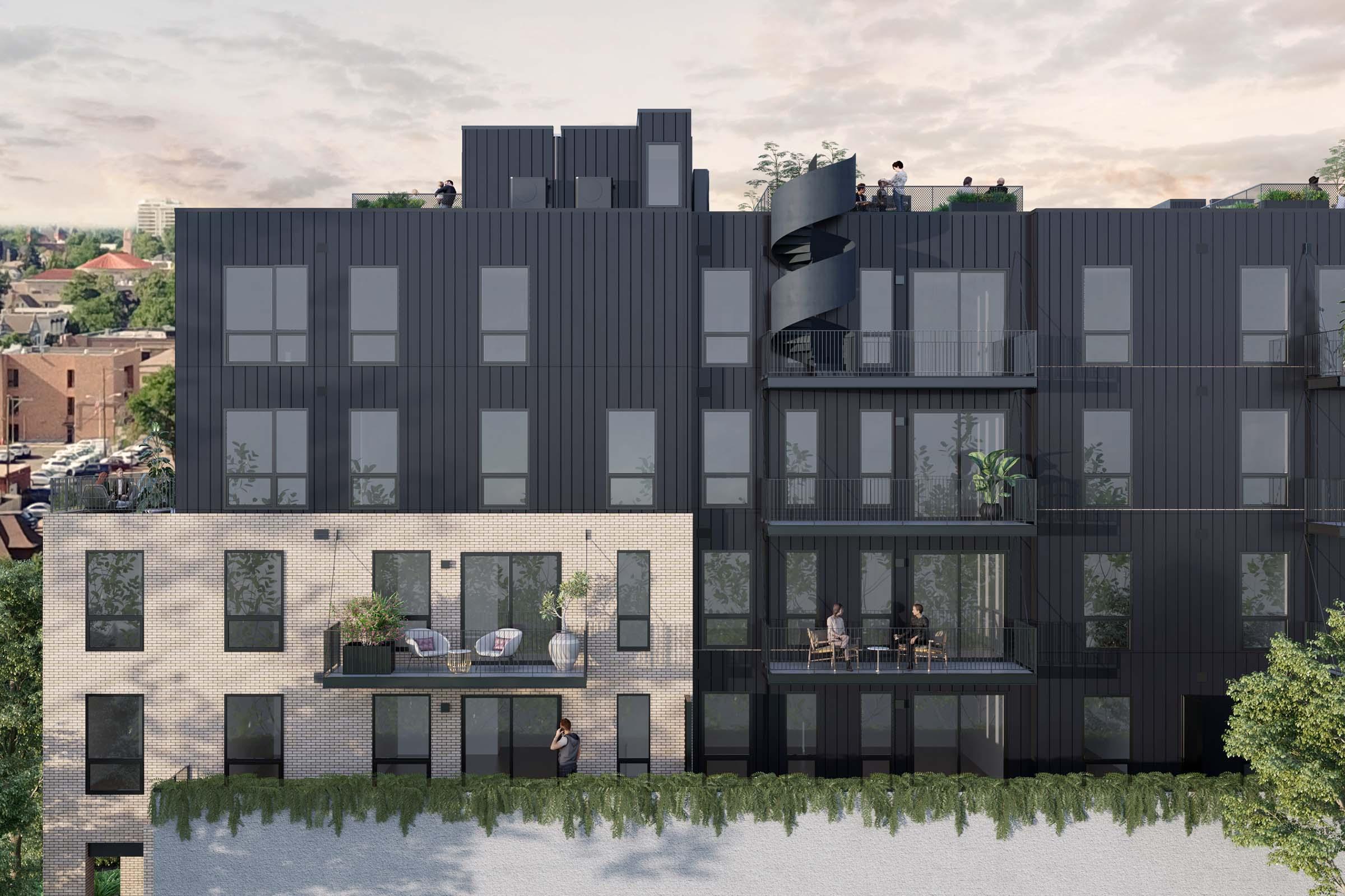 A modern multi-story building featuring a mix of black and brick facades. The structure includes balconies with plants and outdoor seating, large windows, and a spiral staircase. The setting showcases a neighborhood scene with trees and a cloudy sky in the background.