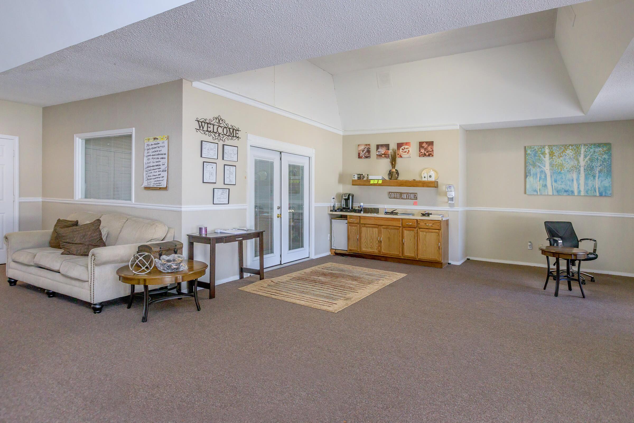 a living room with a wooden floor