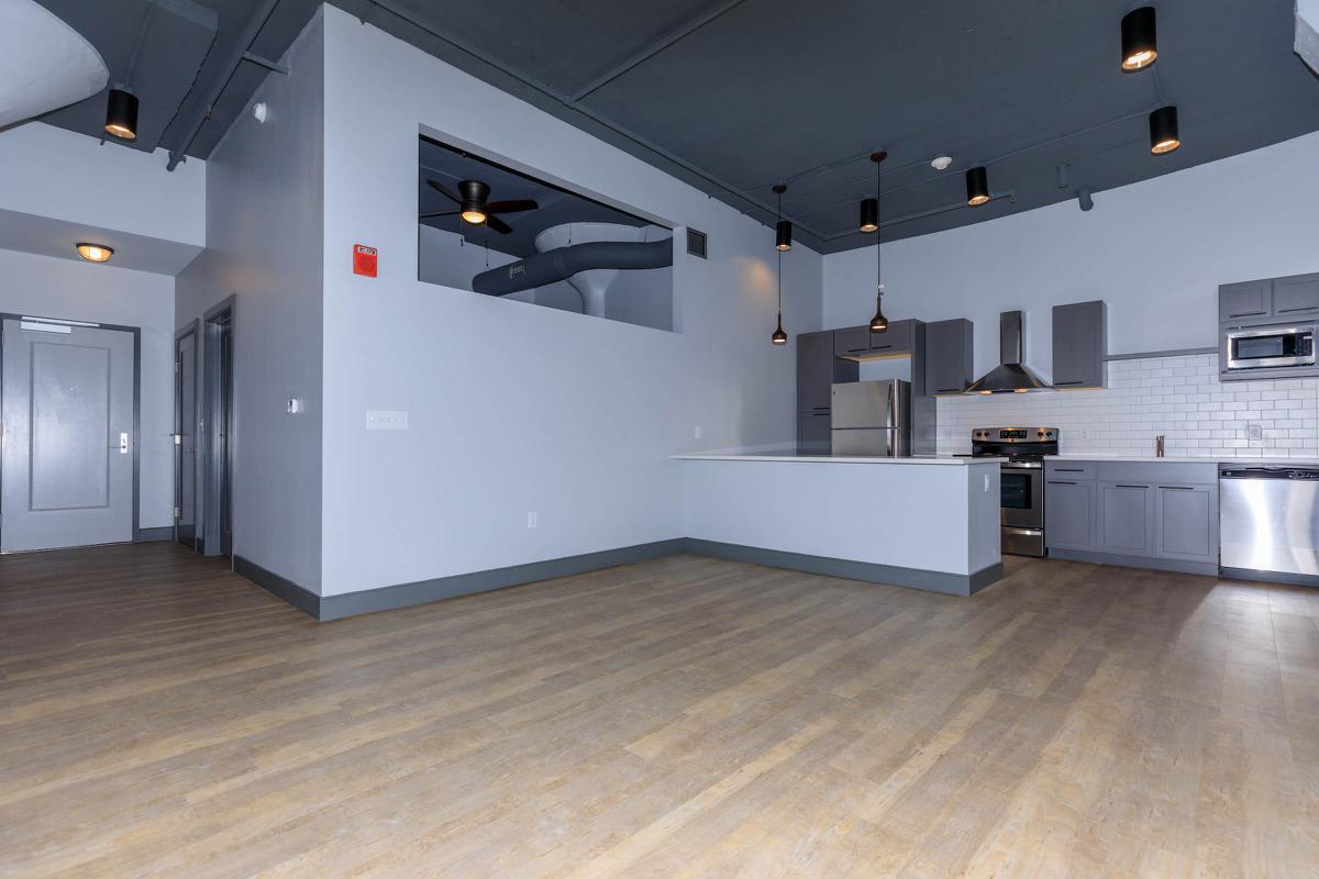 a large kitchen with stainless steel appliances