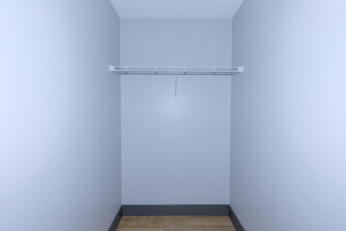 a white refrigerator freezer sitting in a room