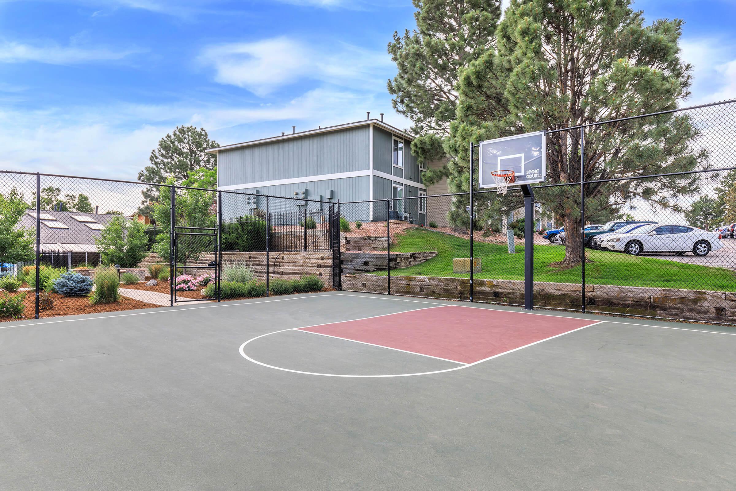 a basketball in a parking lot