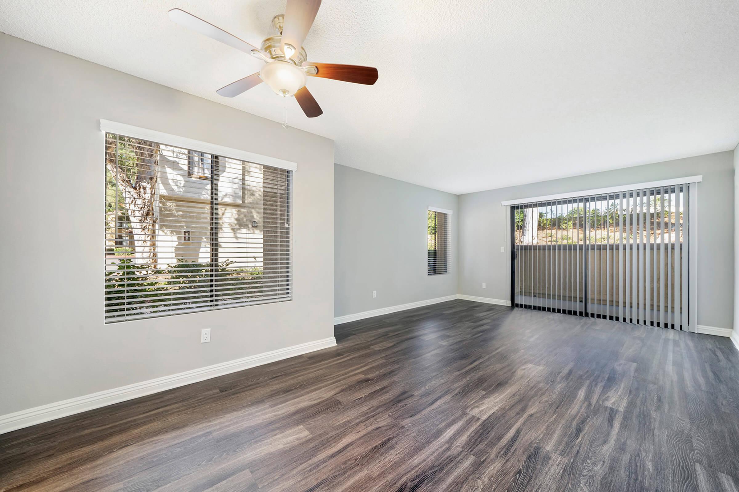 Unfurnished living room with sliding glass doors
