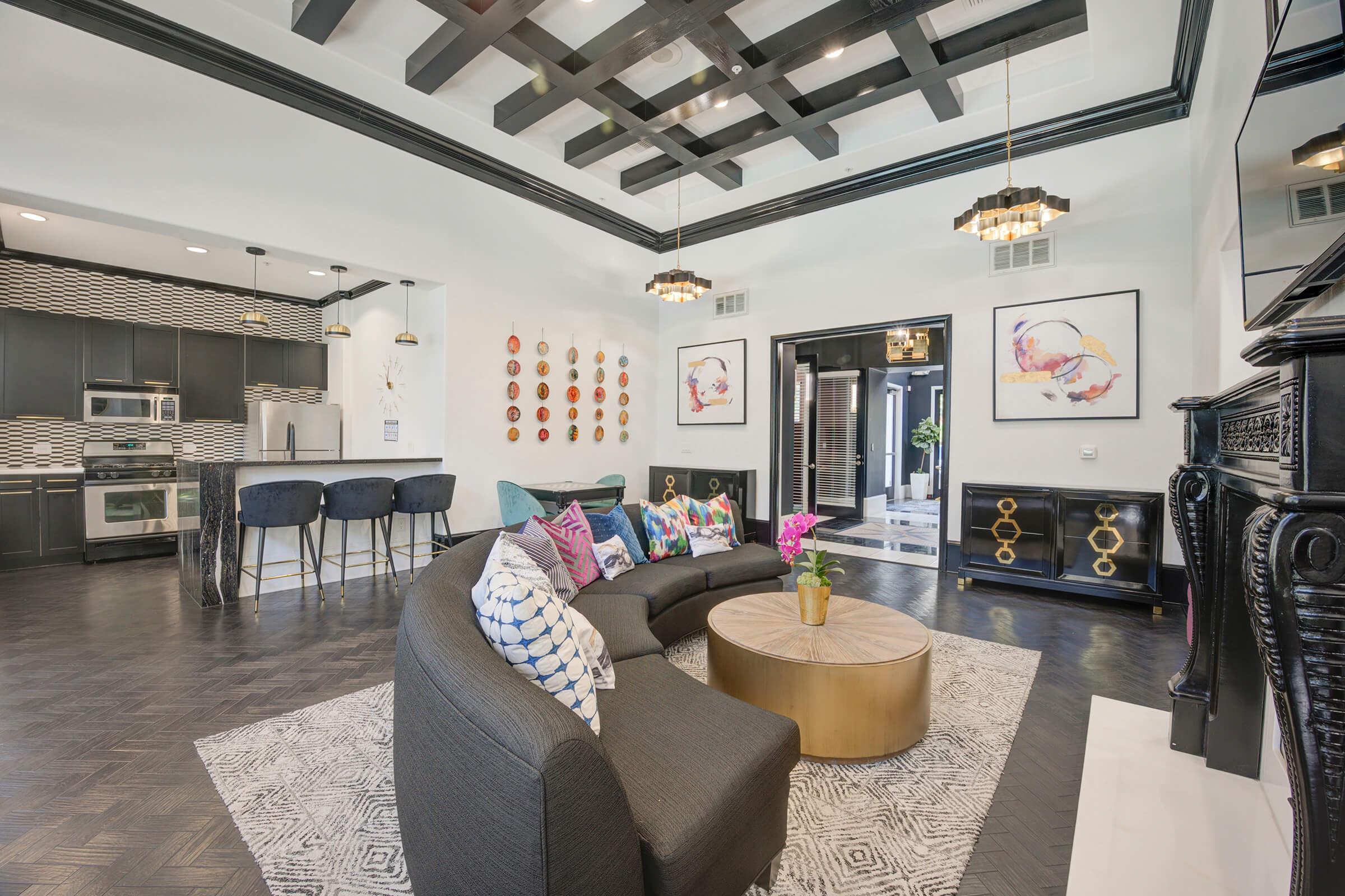 a living room filled with lots of furniture