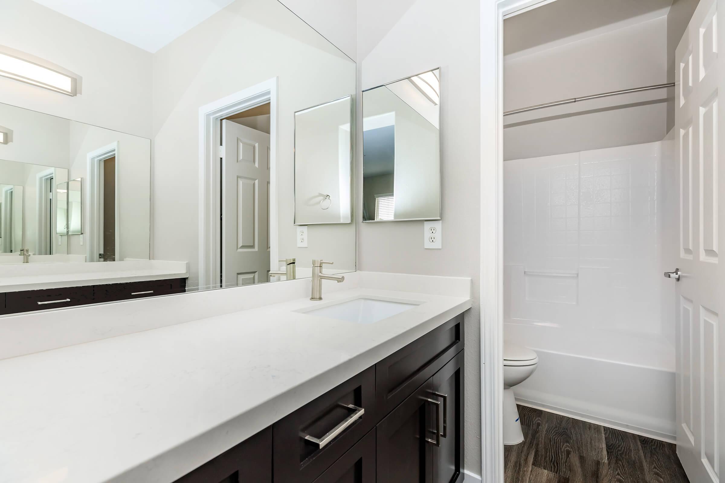 Bathroom sink with open door bathroom door