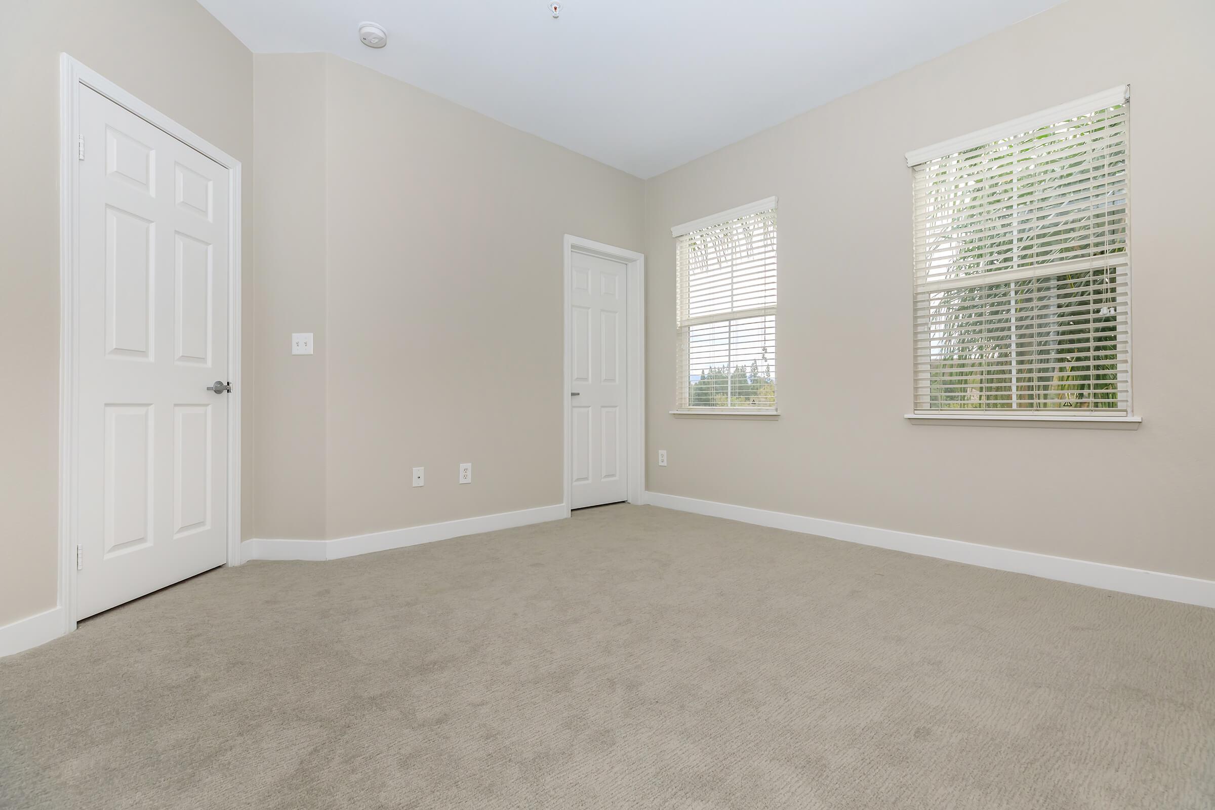 Unfurnished bedroom with carpet