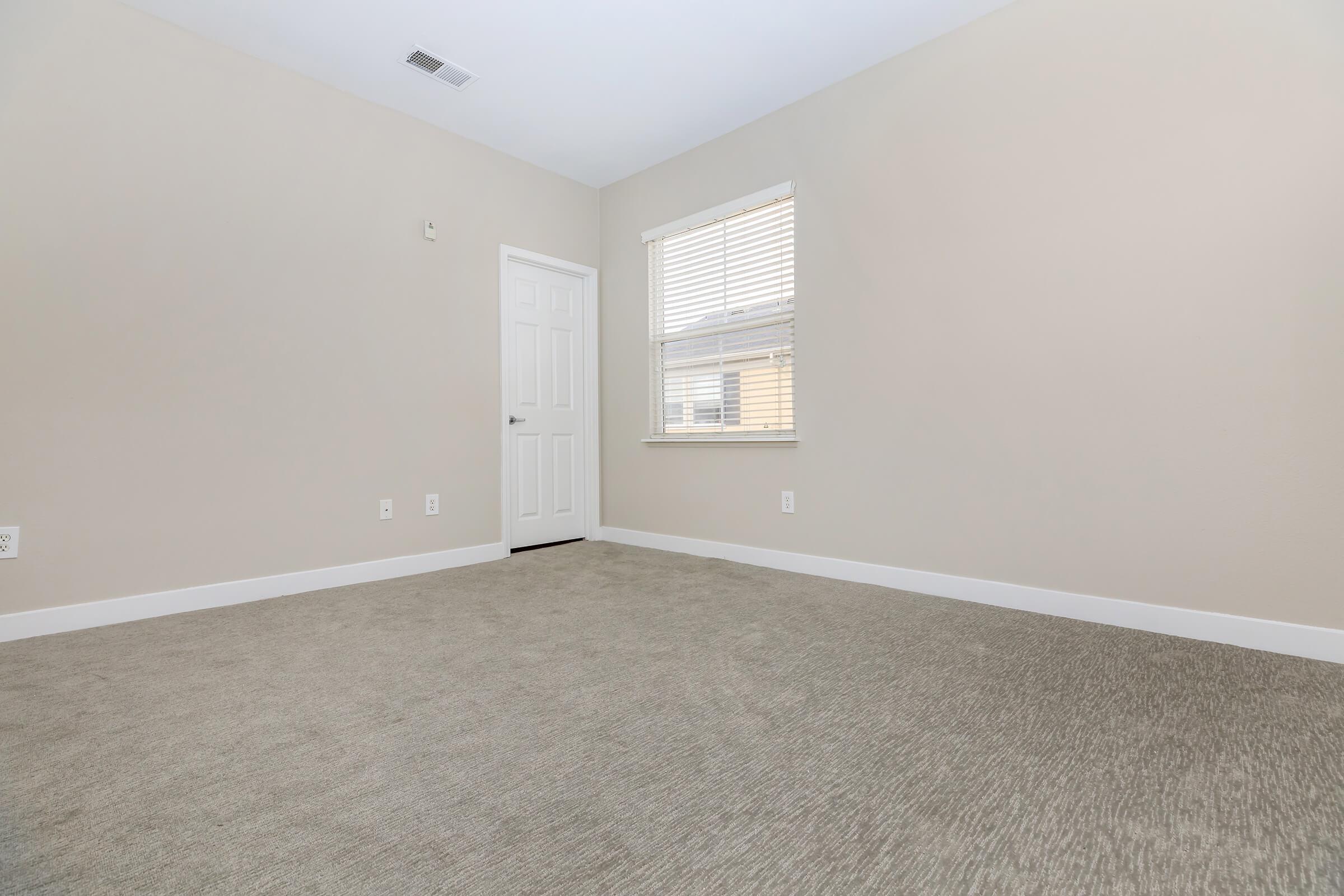 Unfurnished carpeted bedroom