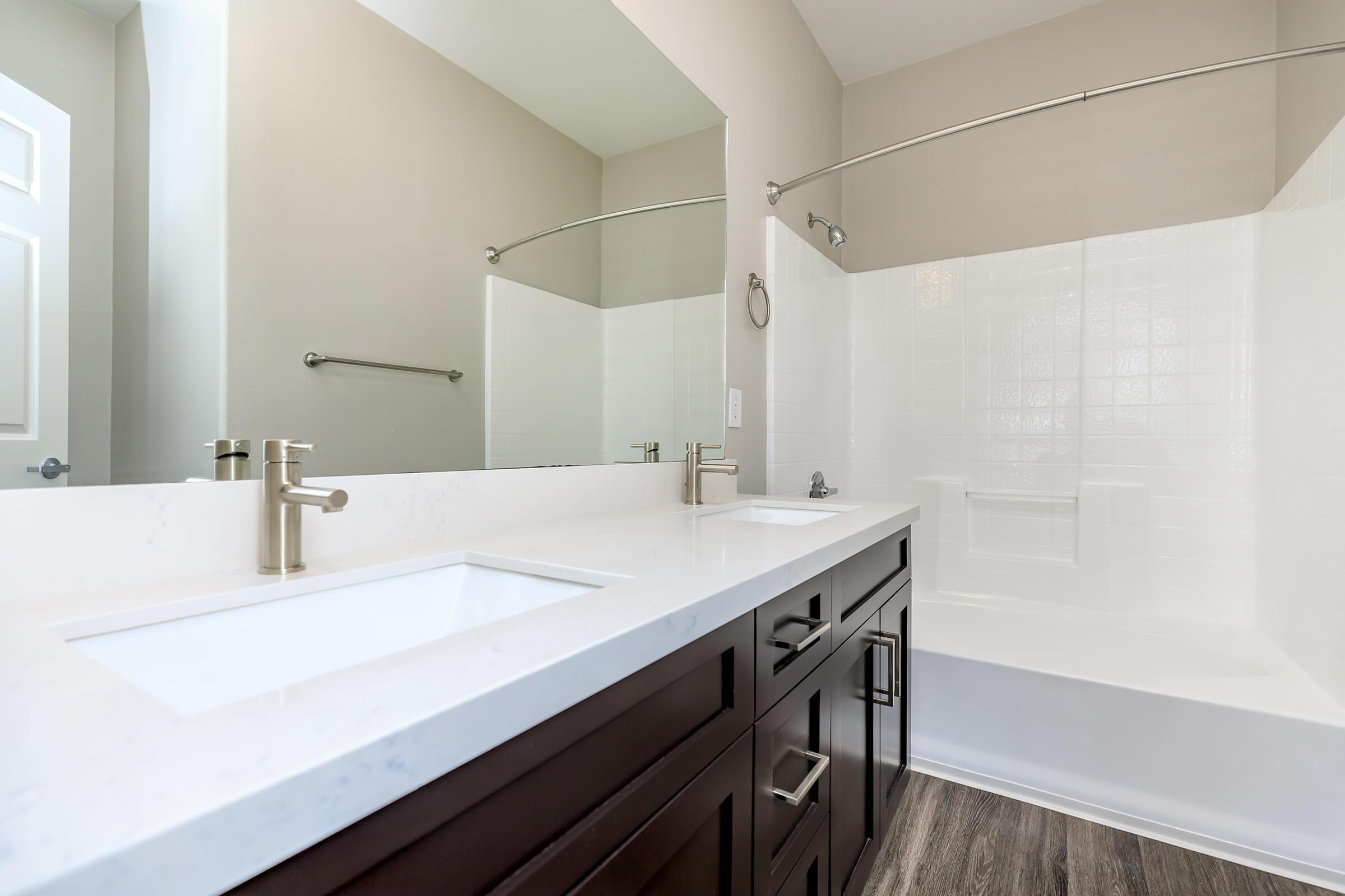 Unfurnished bathroom with wooden floors