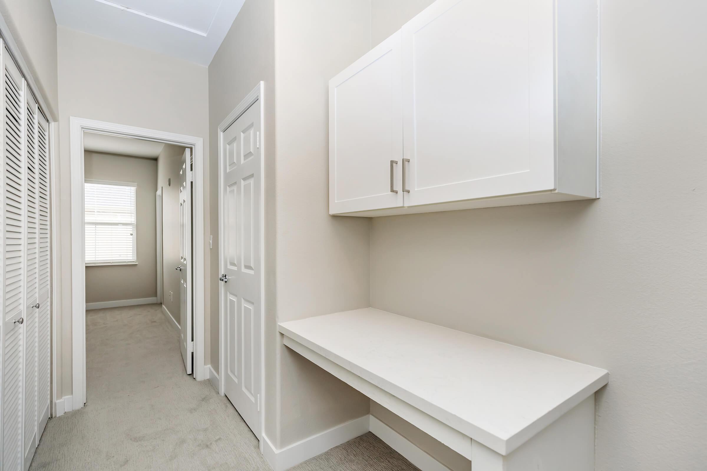 Hallway with cabinets