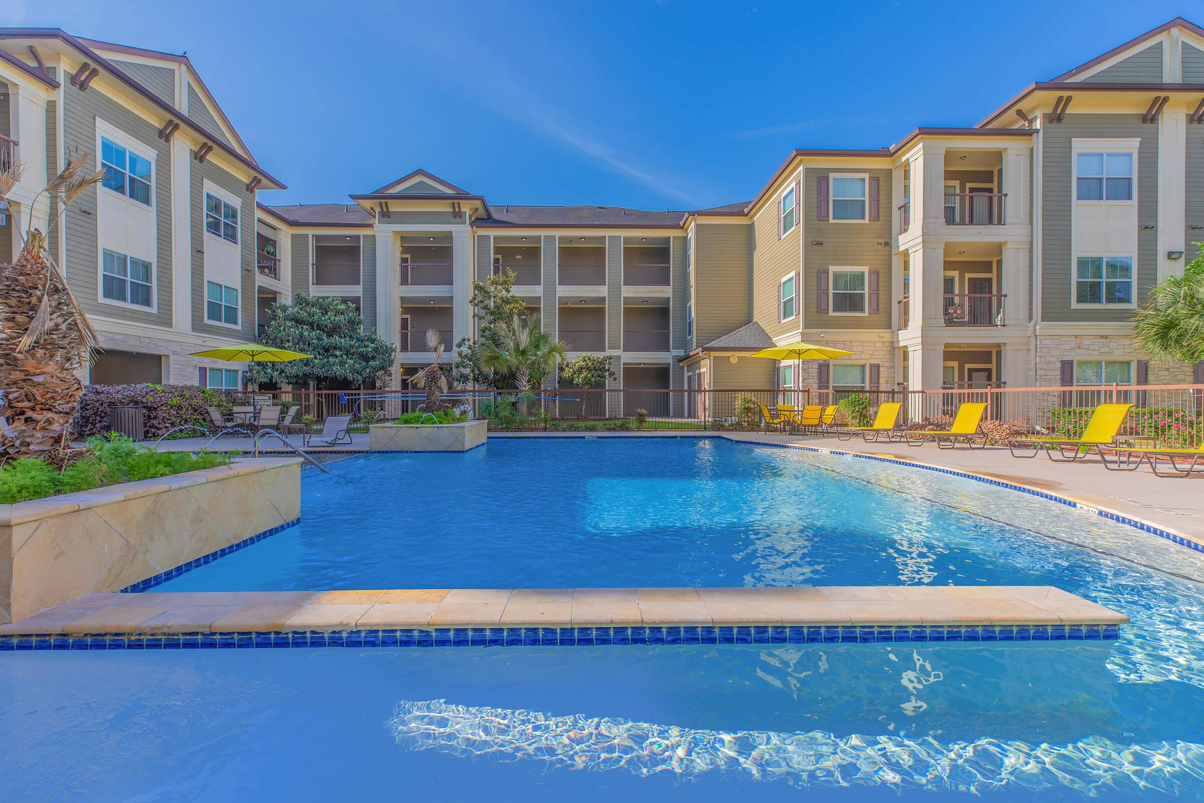 a pool of water in front of a building