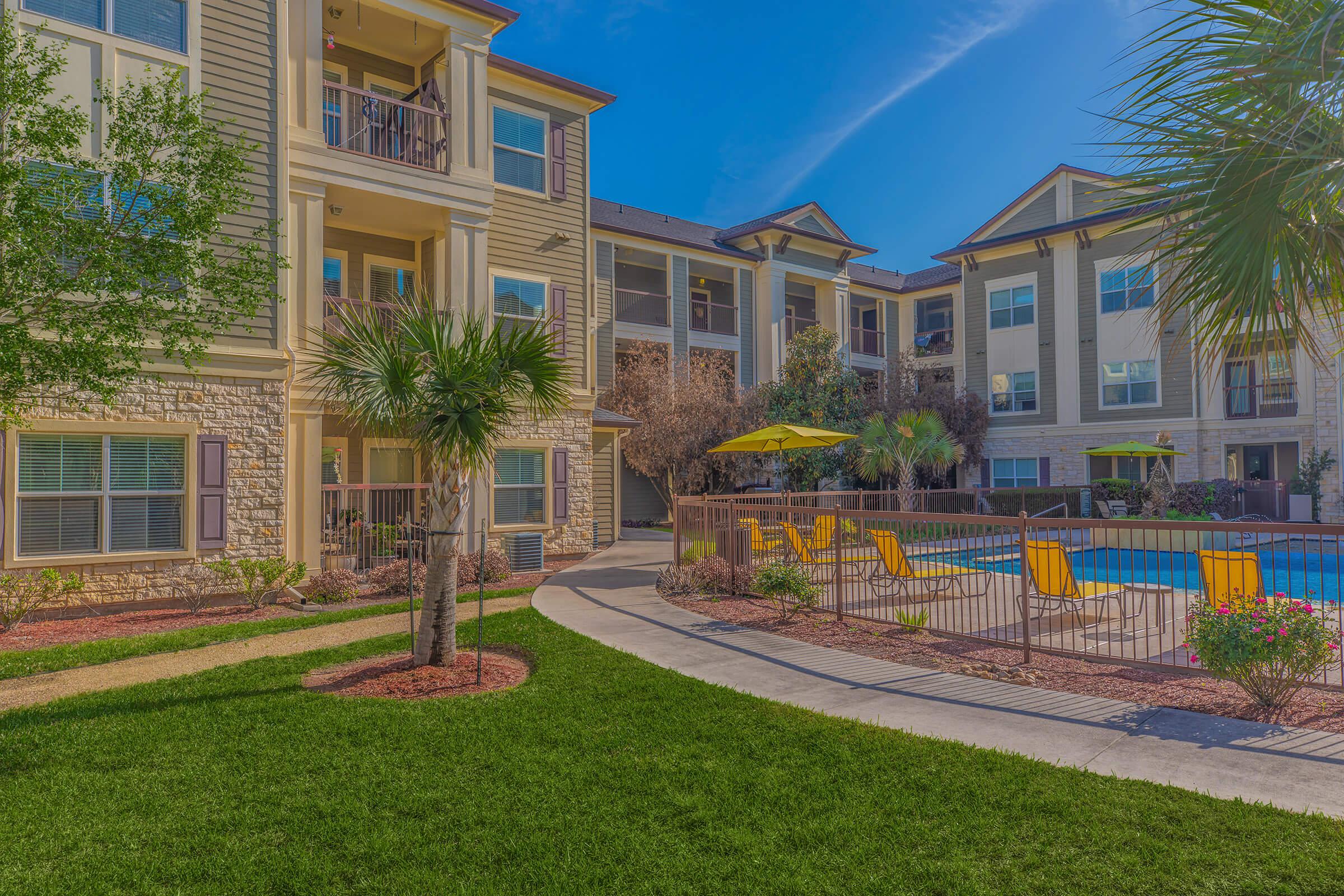 a large lawn in front of a building