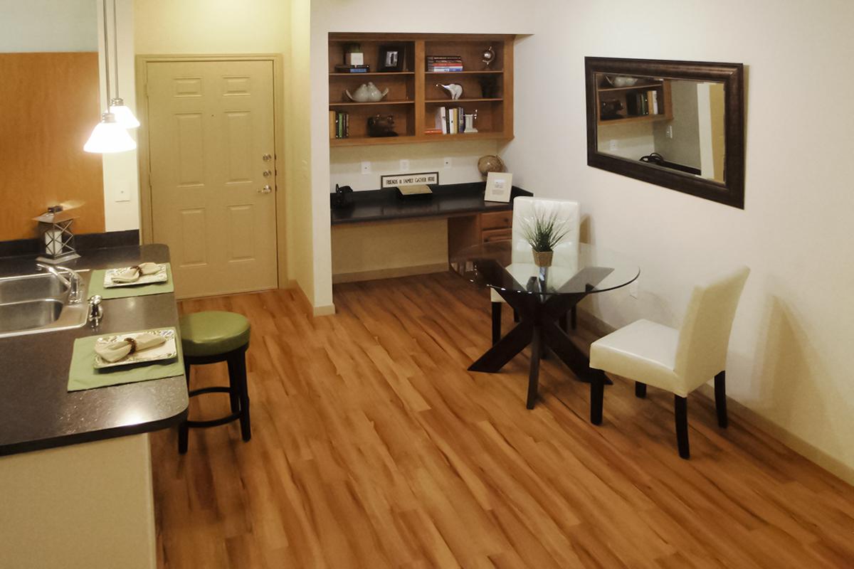 a view of a living room with a wood floor