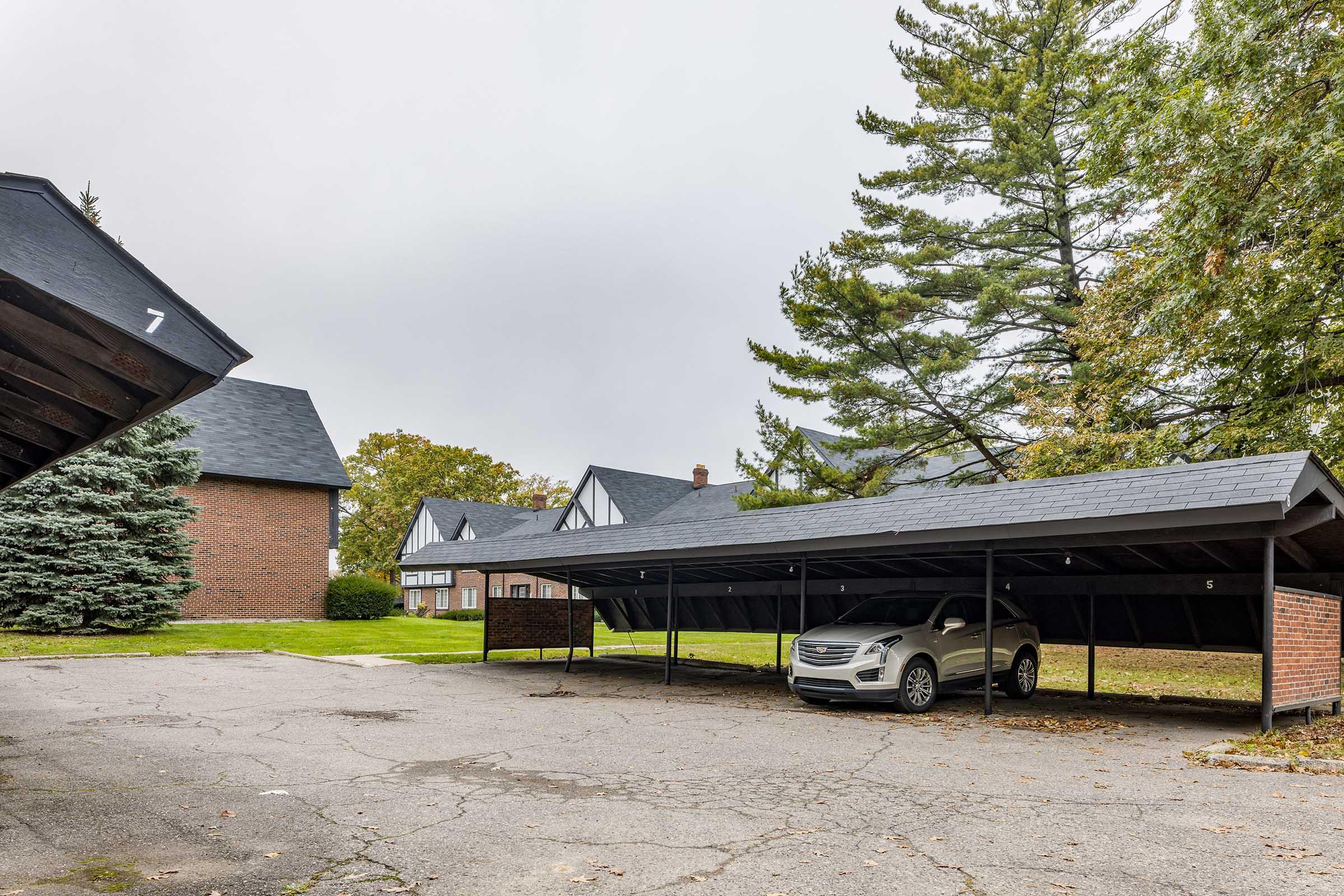 a house that is parked on the side of a building