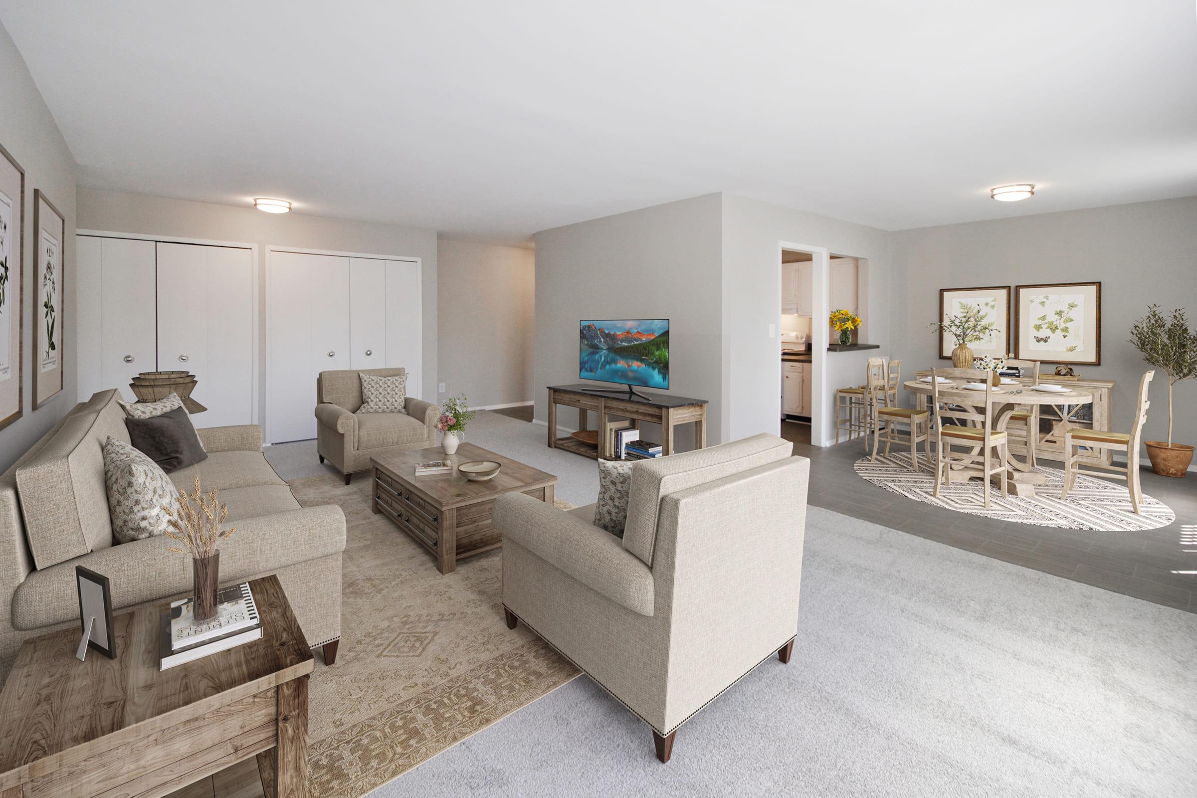 a living room filled with furniture and a fireplace