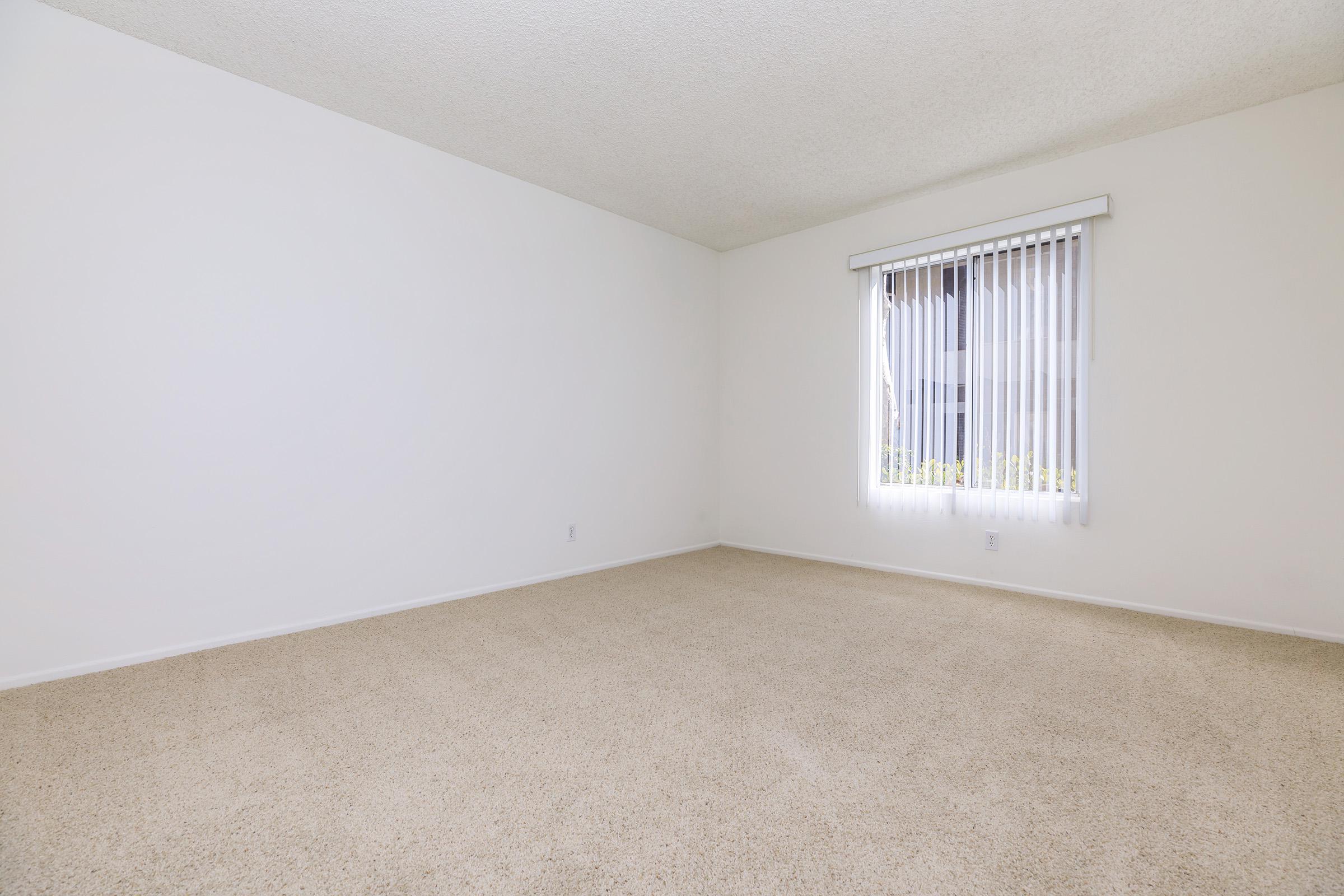 Bedroom with carpet