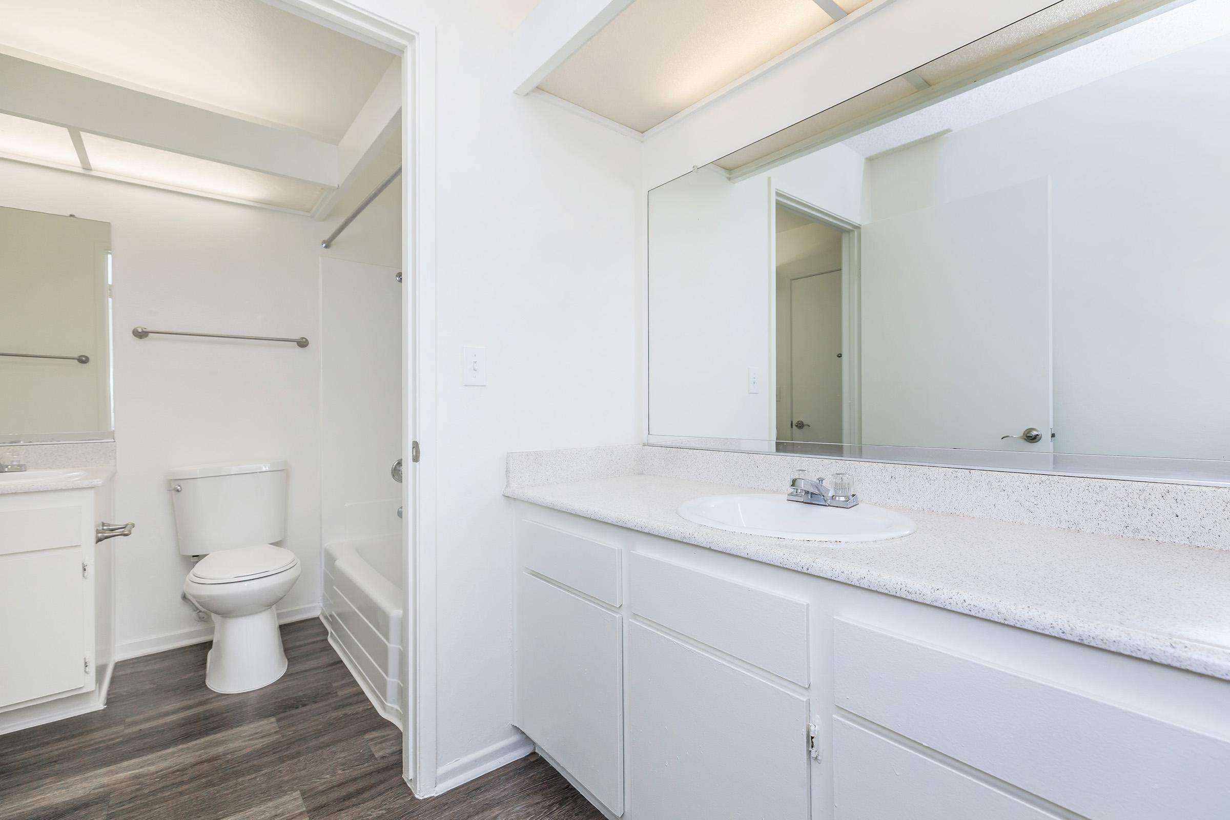 Bathroom with white cabinets