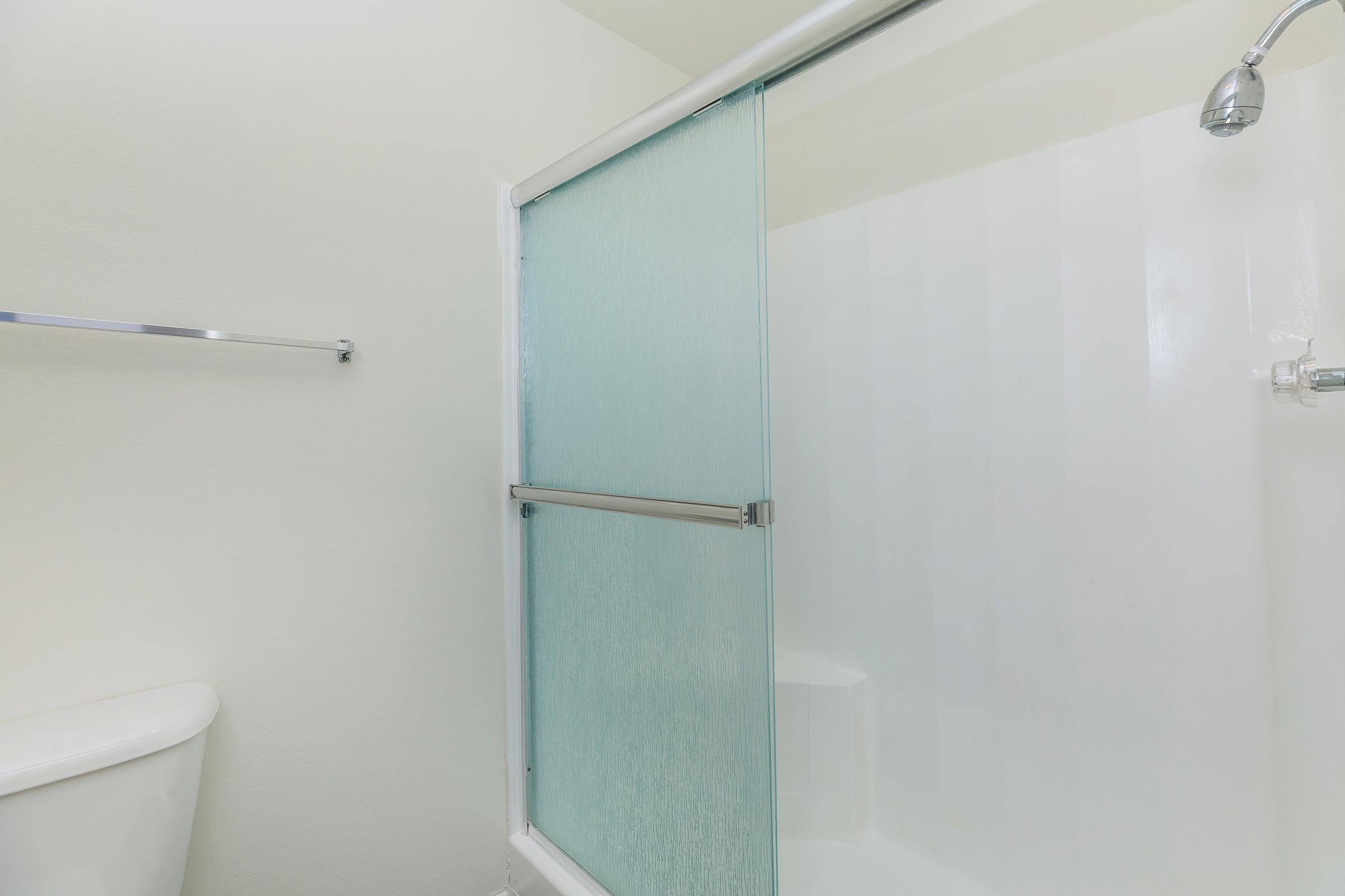 Bathroom with sliding glass shower door