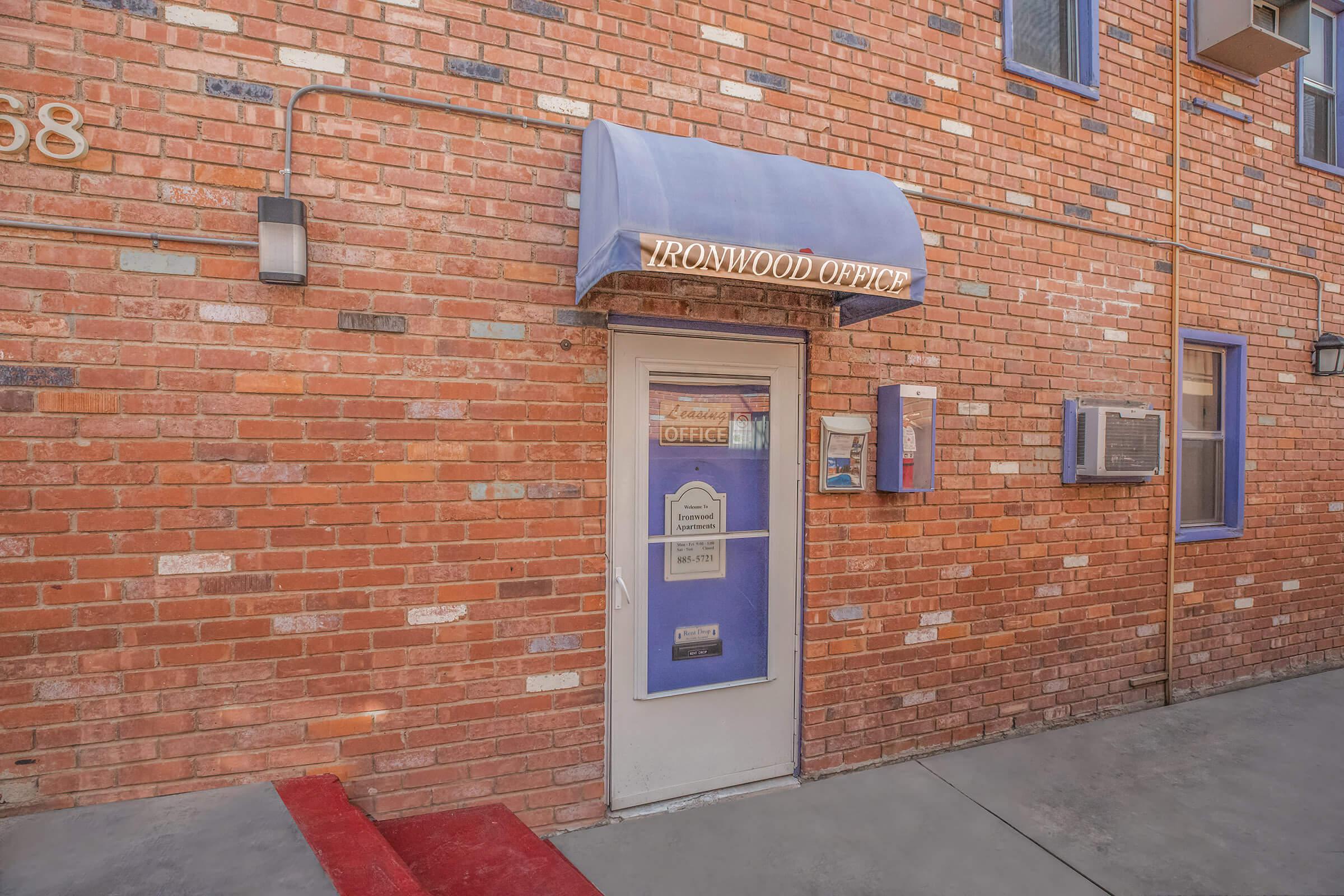 a store in a brick wall