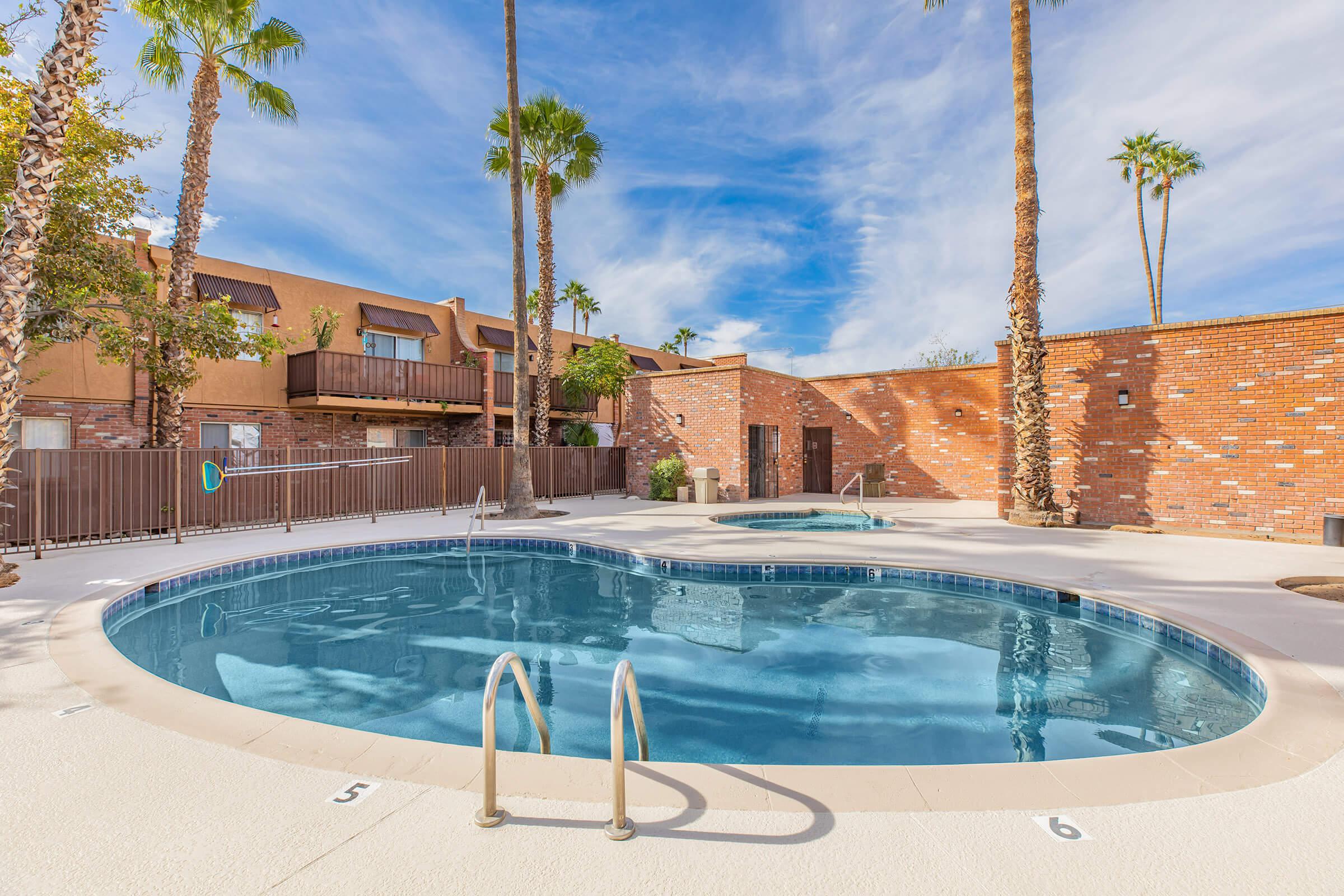 a pool next to a building