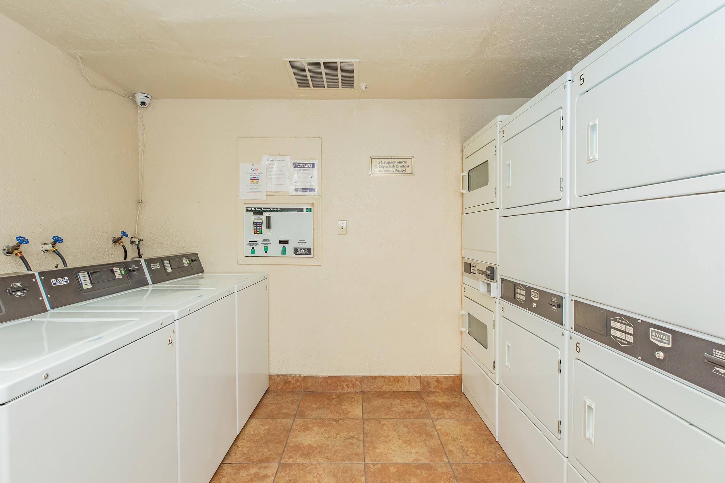 a kitchen with a stove and a refrigerator