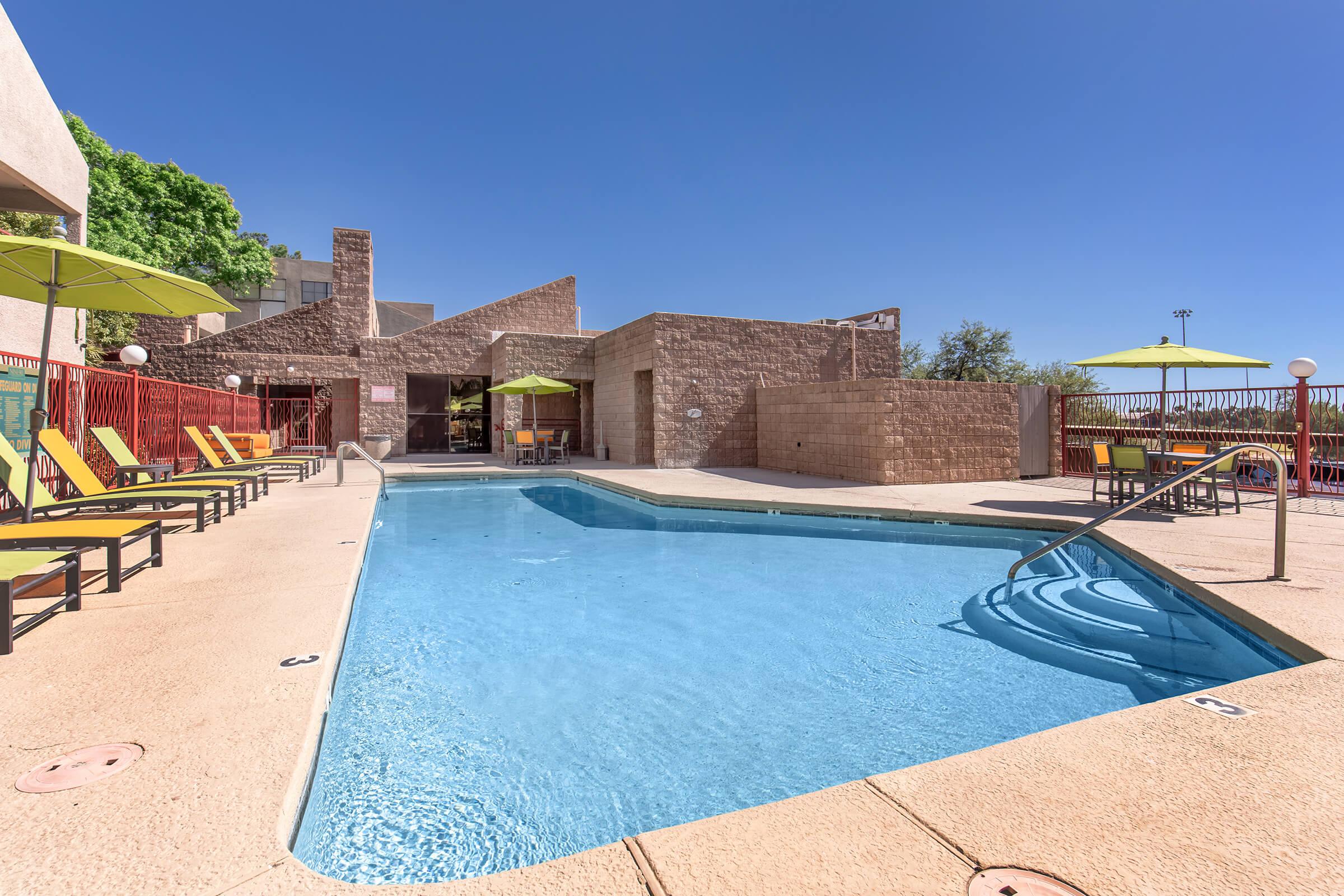 a pool next to a building