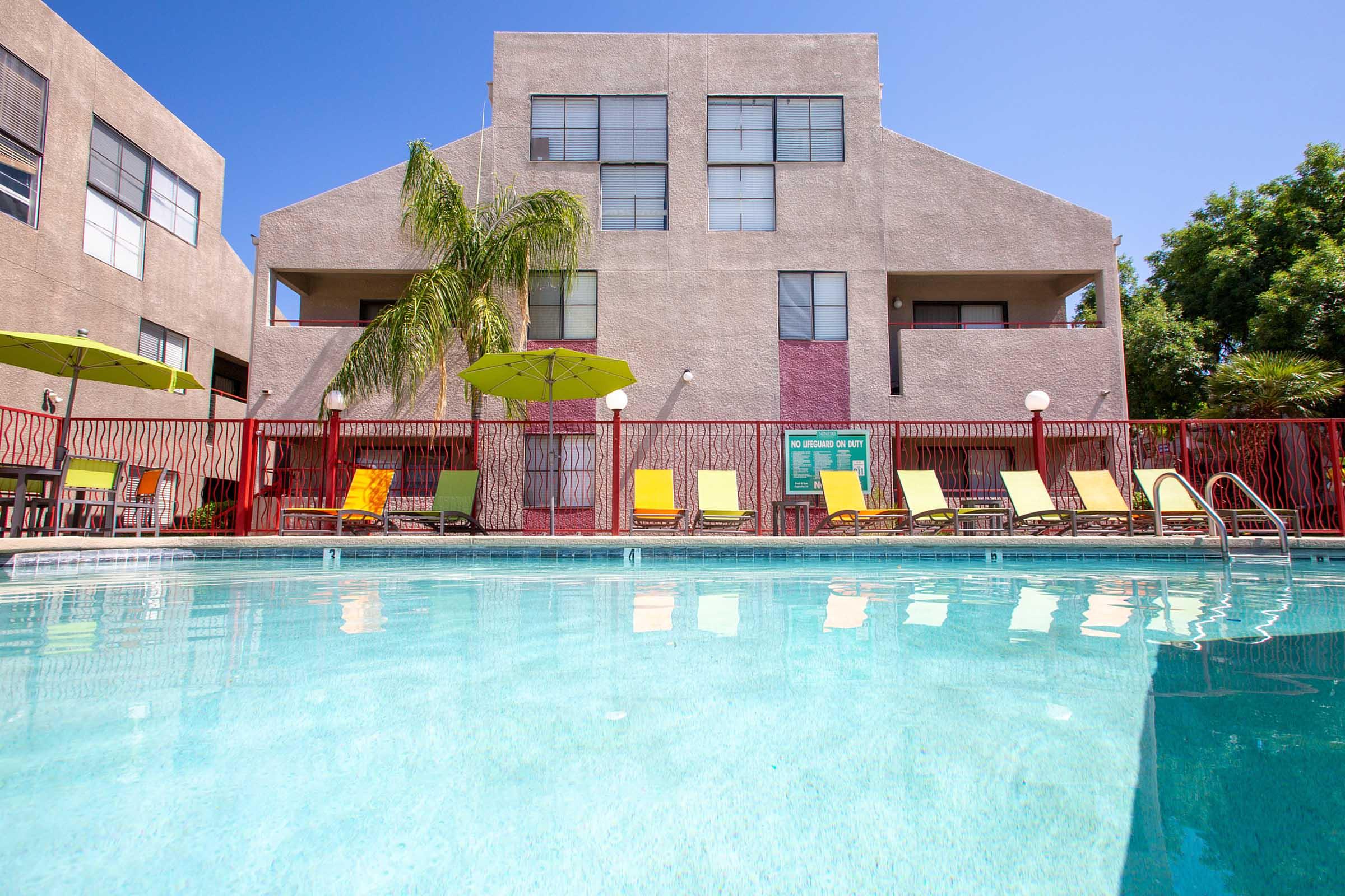 a large pool of water in front of a building