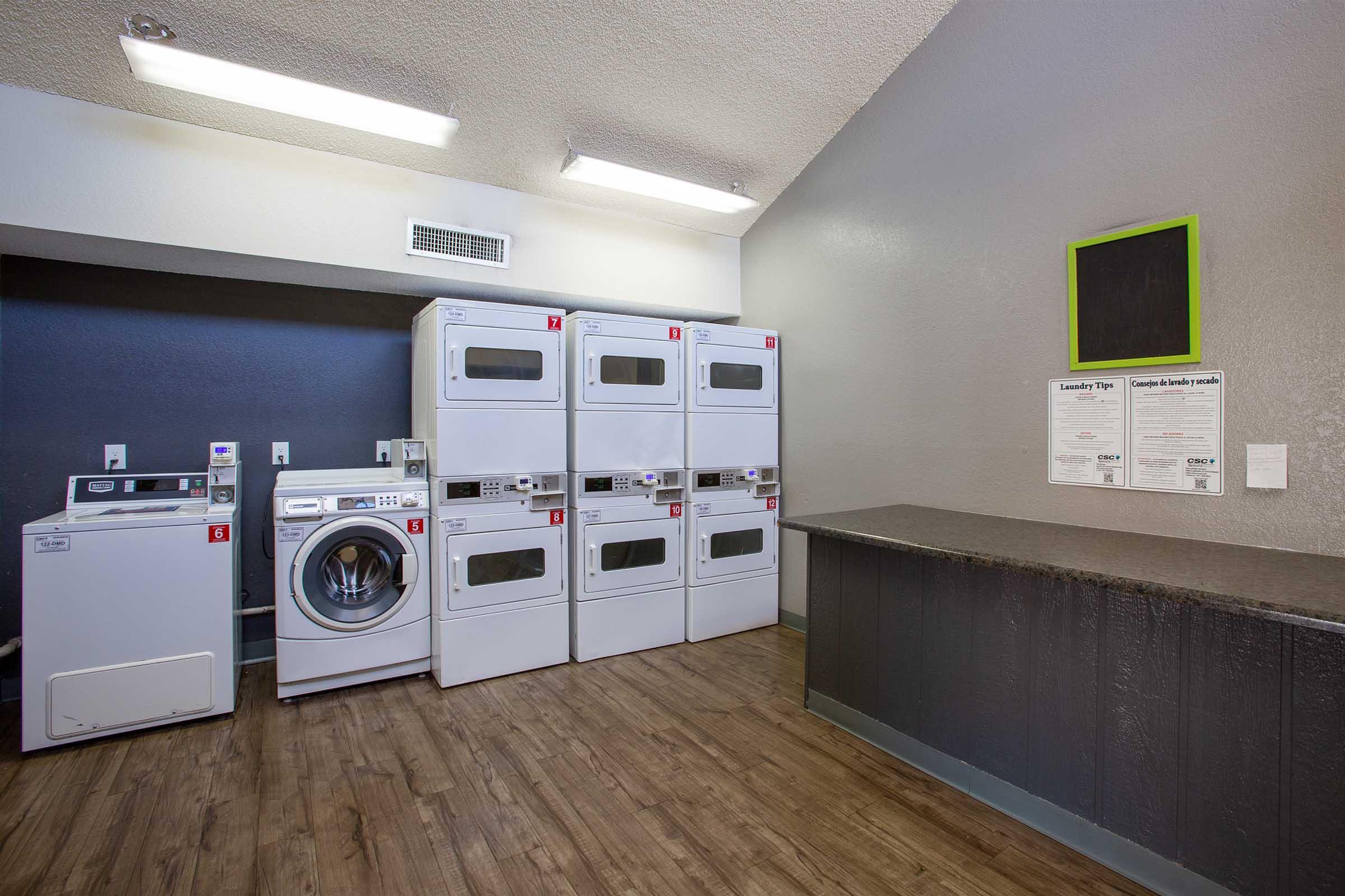 a kitchen with a stove and a refrigerator