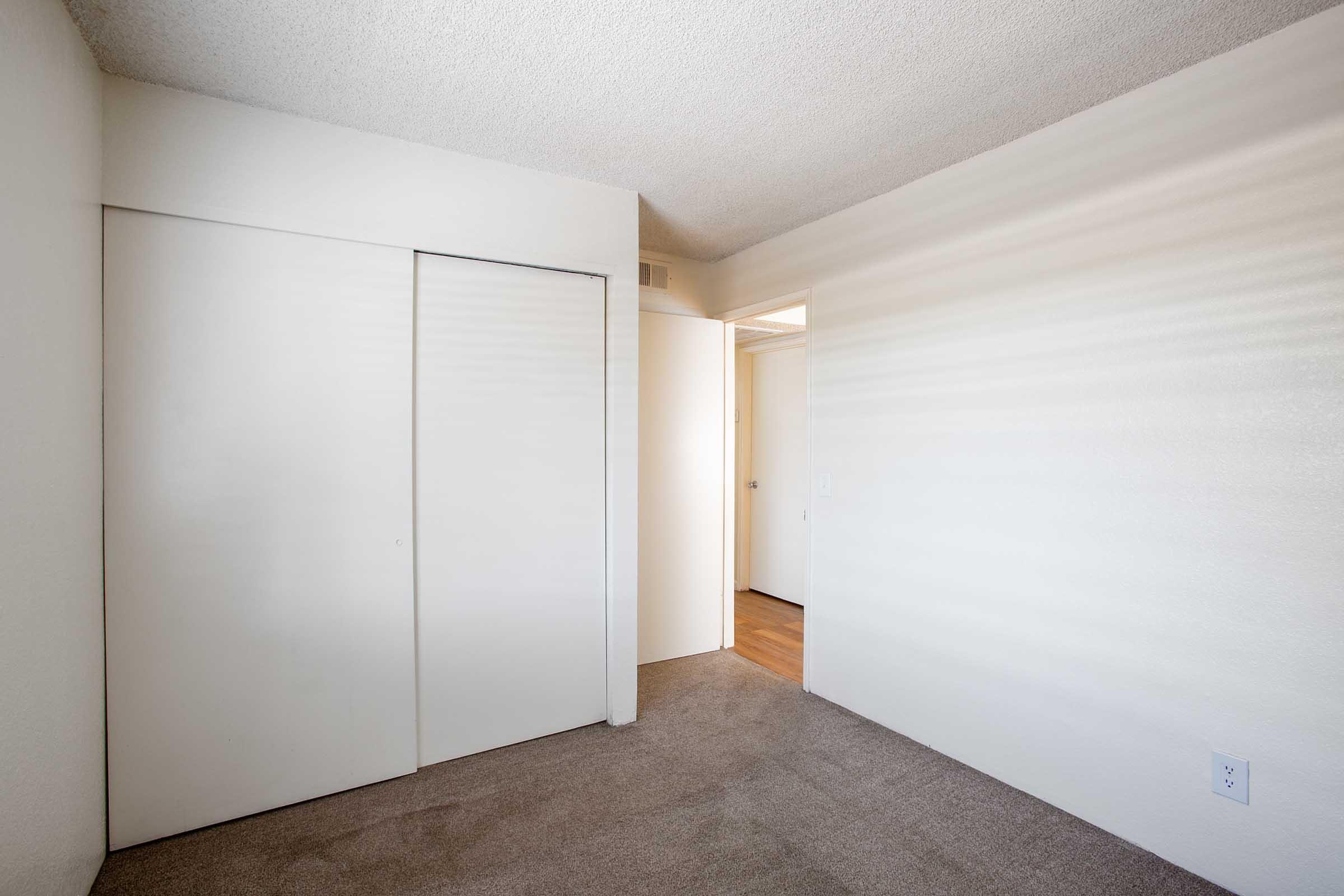 a refrigerator in a small room