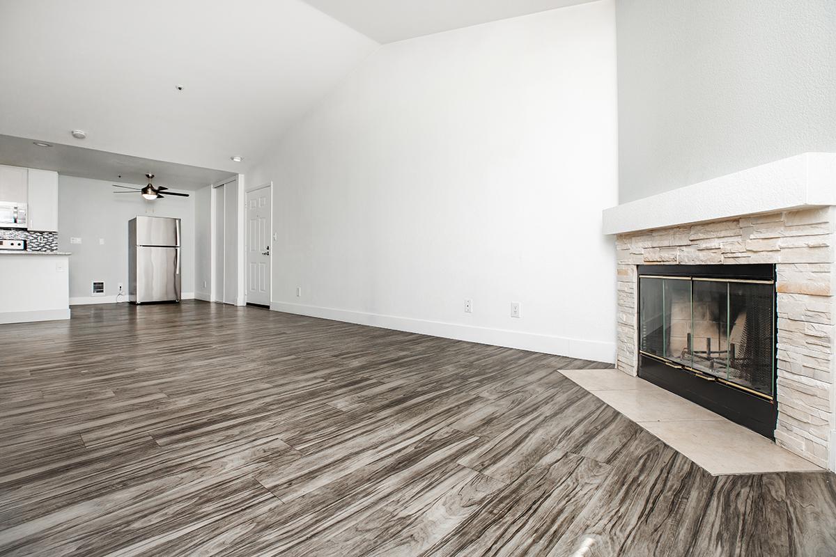 a room filled with furniture and a fireplace