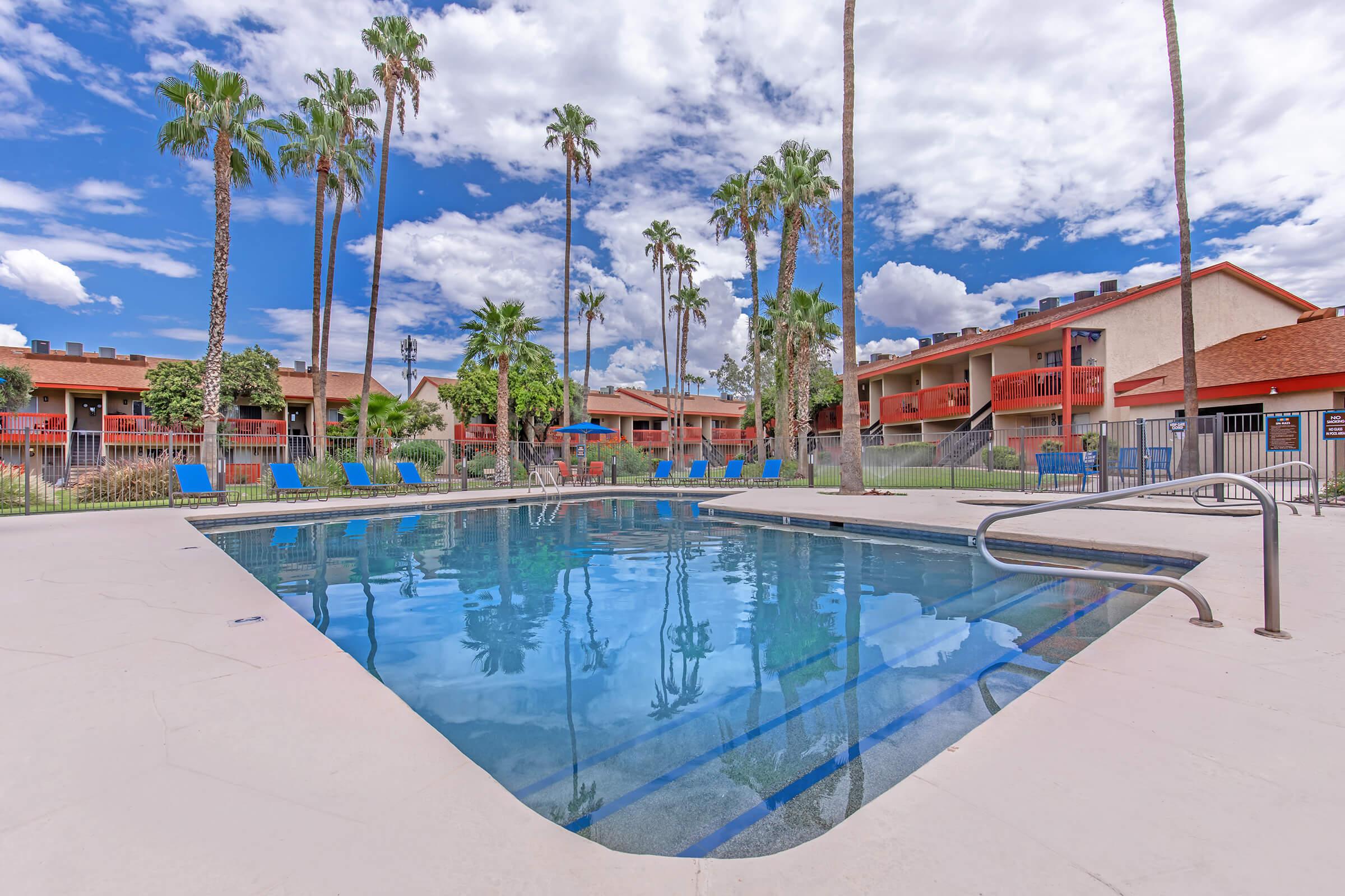 a pool next to a body of water